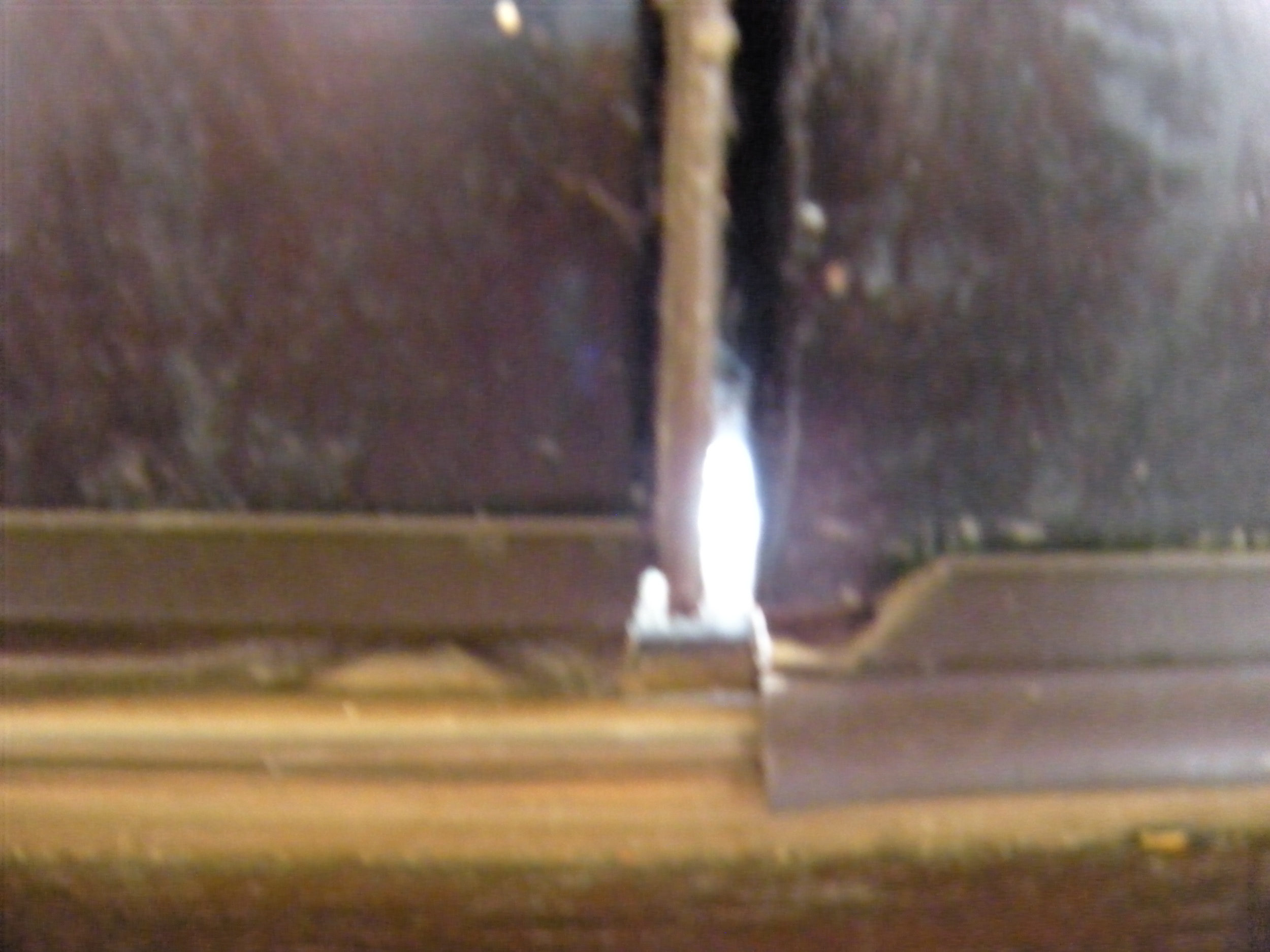 The very obvious gap at the center bottom between our two front doors. 