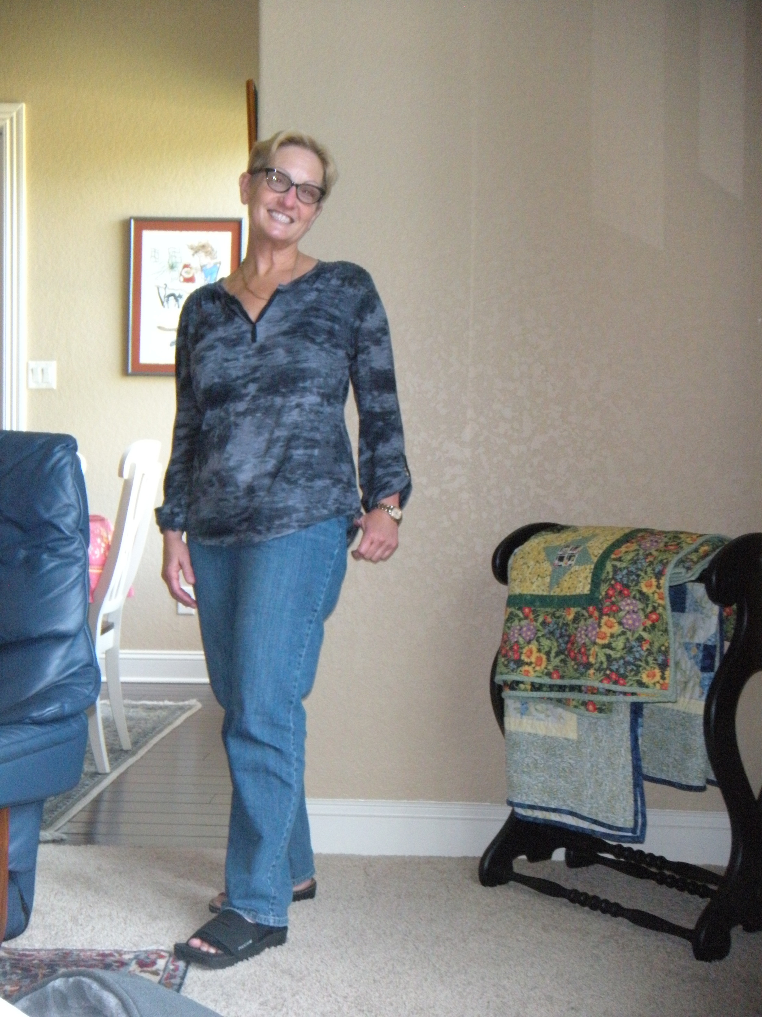 Me on a fallow day. No make-up or earrings, baggy jeans. See the boot--toe still broken. 