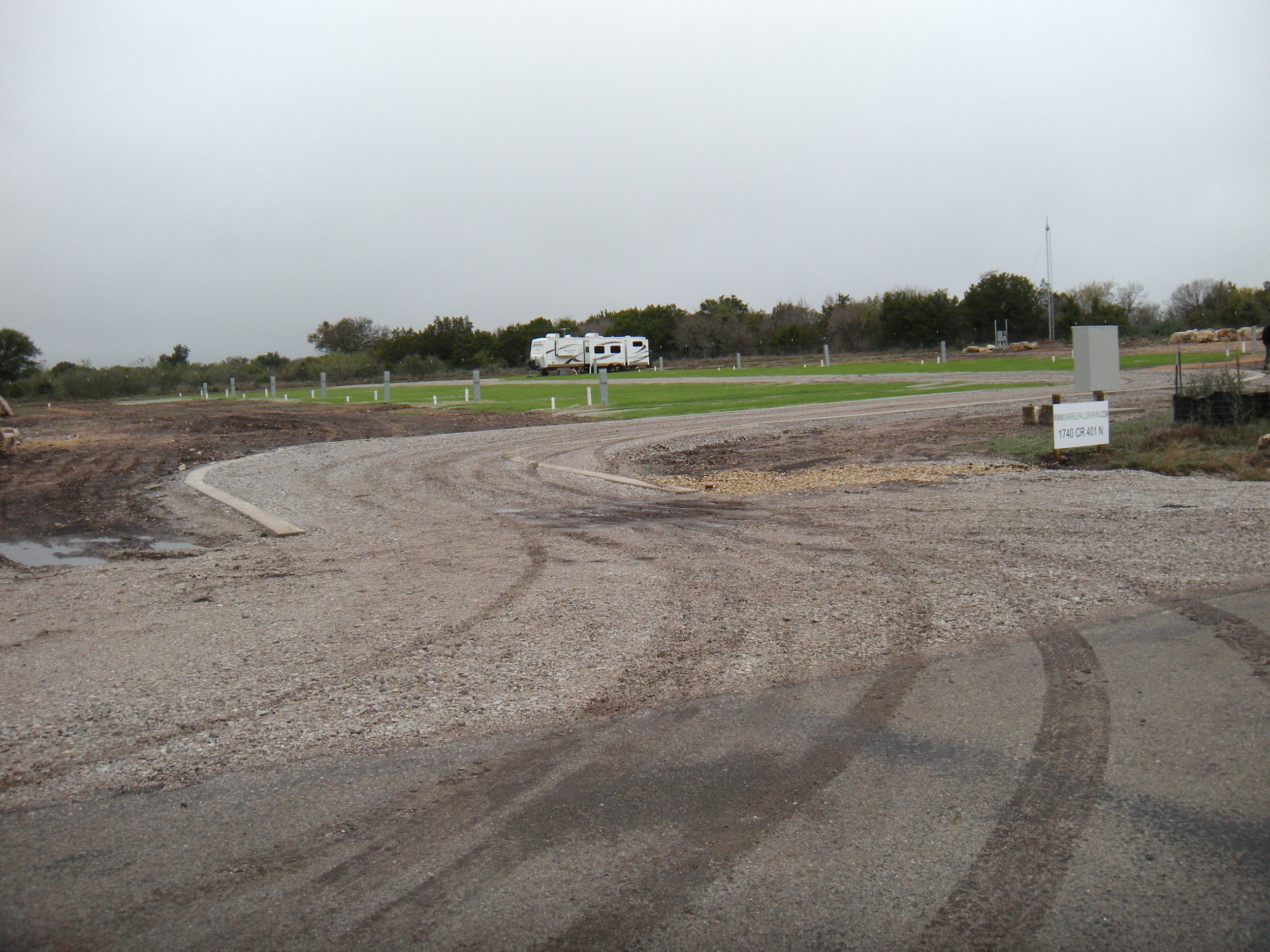 The new RV Park. There are fourteen stations. Someone moved this fifth-wheel on to the property a couple of months ago. Doesn't this look like a front for some nefarious activity? 