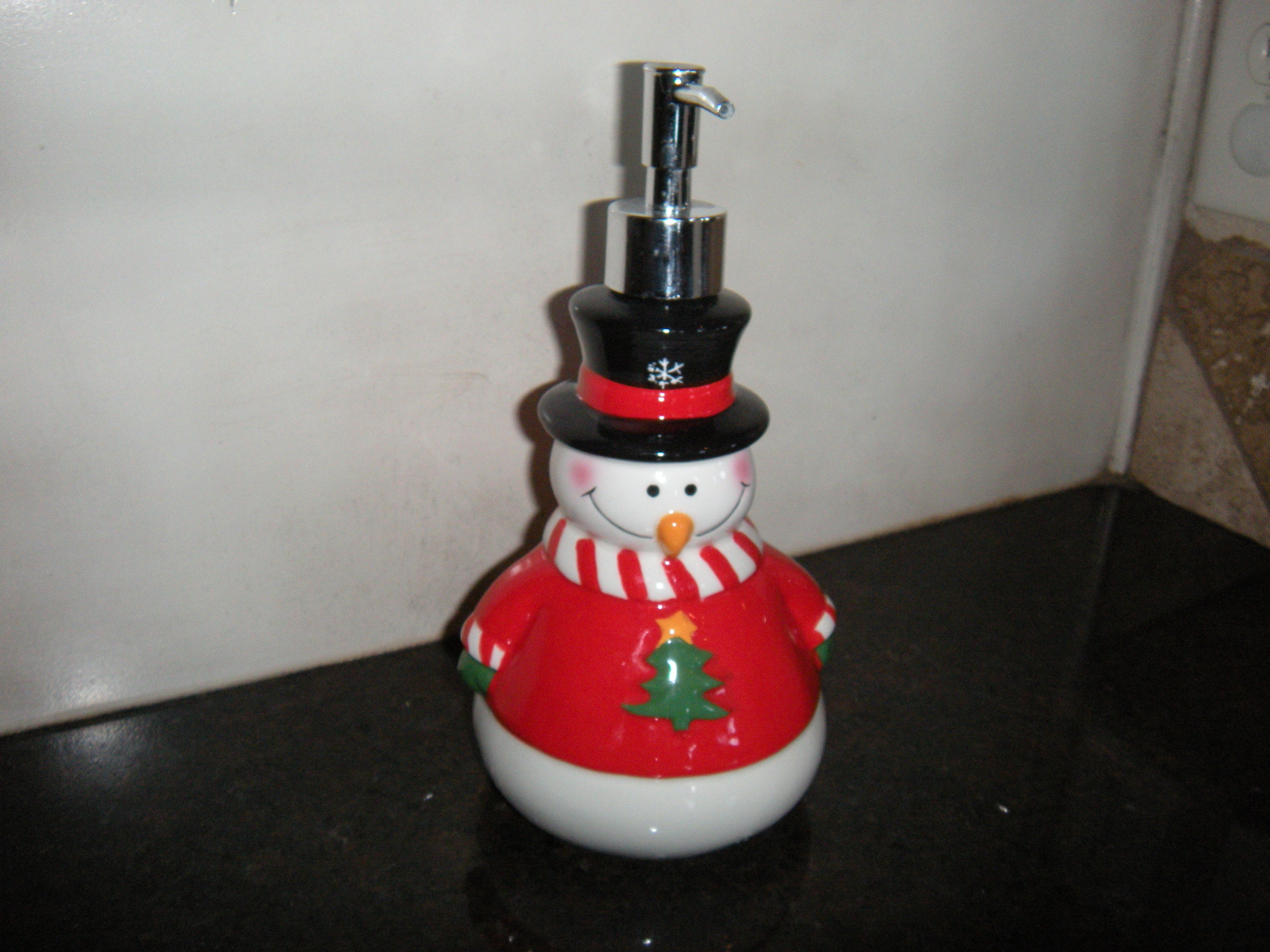 I even have a Christmas soap dispenser, which Curtis gave me for my birthday. 