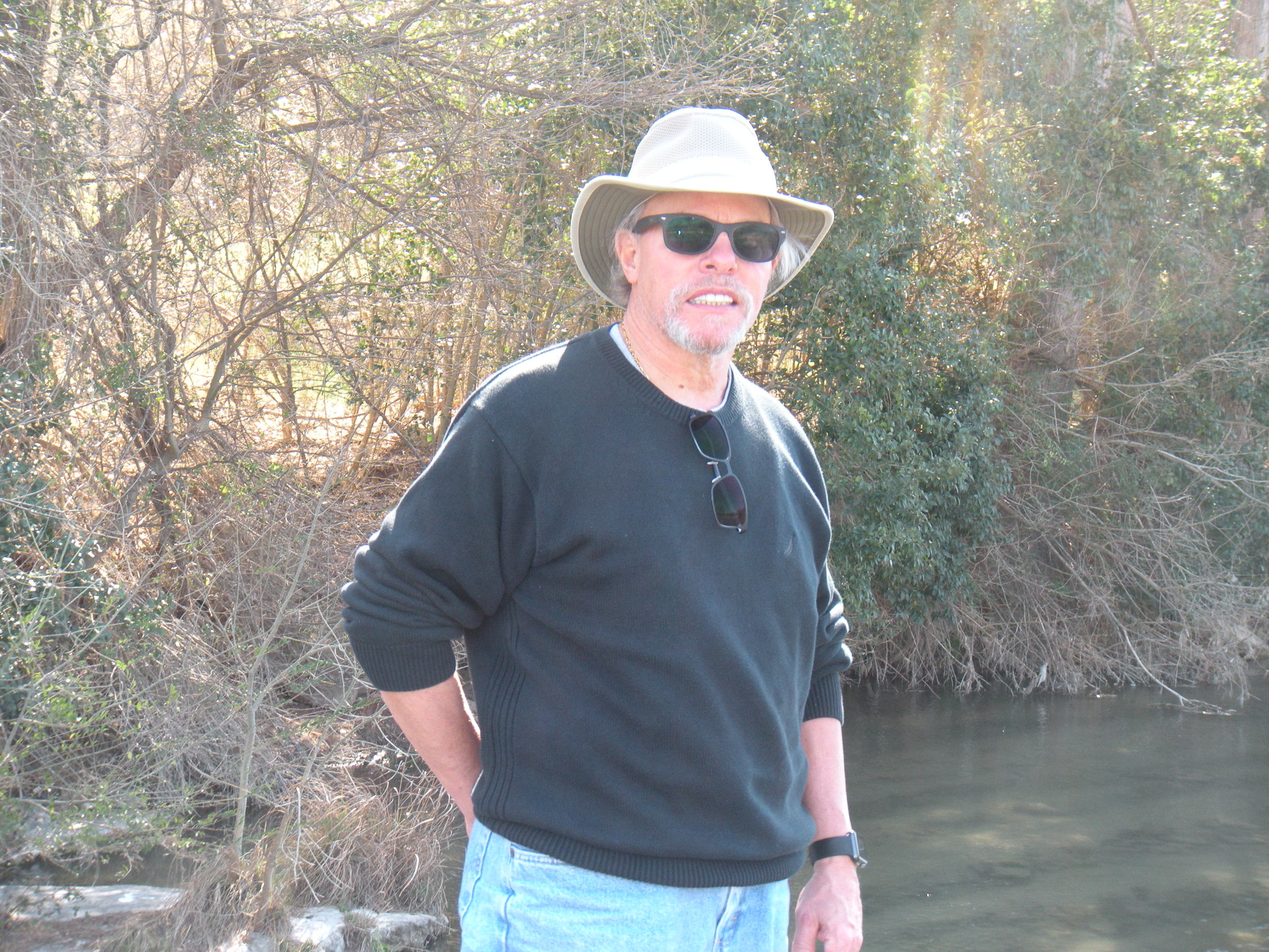 David's happy by the river.