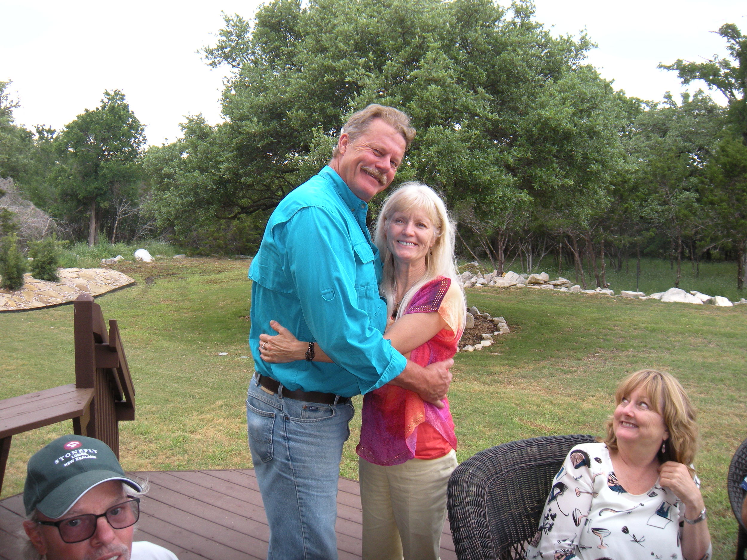 Tom and Gitte. David and Tere in chairs. Our back yard.
