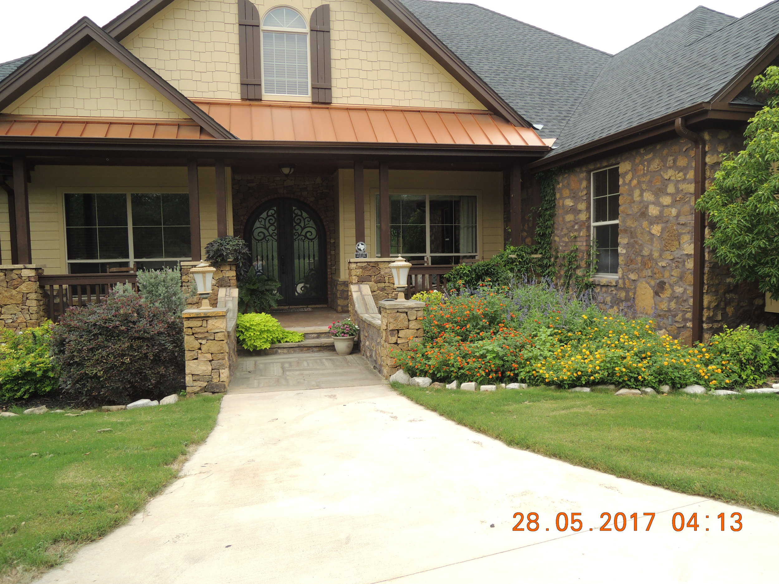 The house looks pretty this time of year. David is a great gardener. 