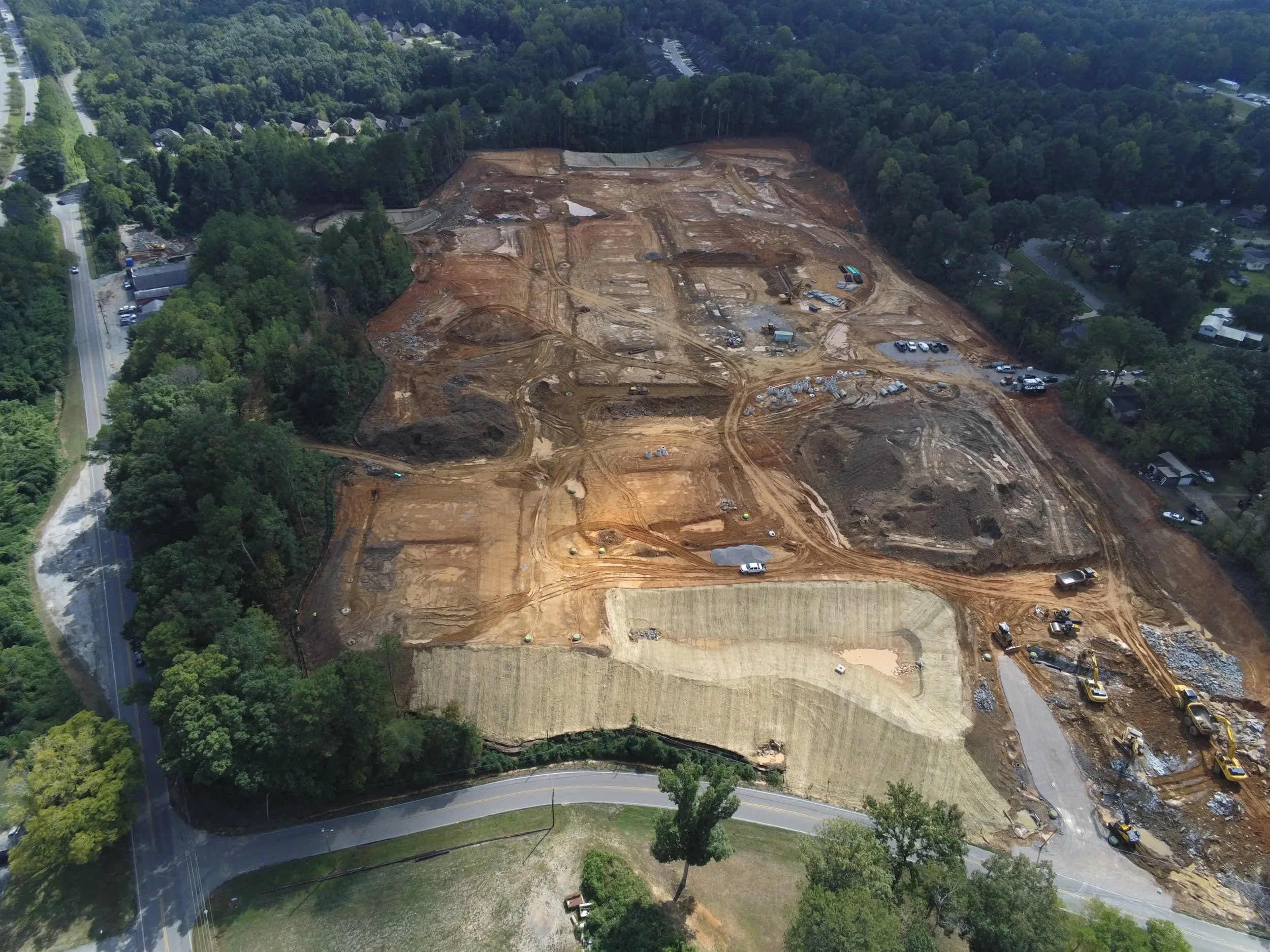  20 Acres of Clearing  100,000+ CY of Onsite Material Moved  30,000+ CY of Mass/Trench Rock Hammered  4,400+ LF of Storm Drainage Installed  7,000+ LF of Water and Sanitary Installed  19+ Acres of Fine Grading Roadways and Homesites  7,000+ LF of 18”
