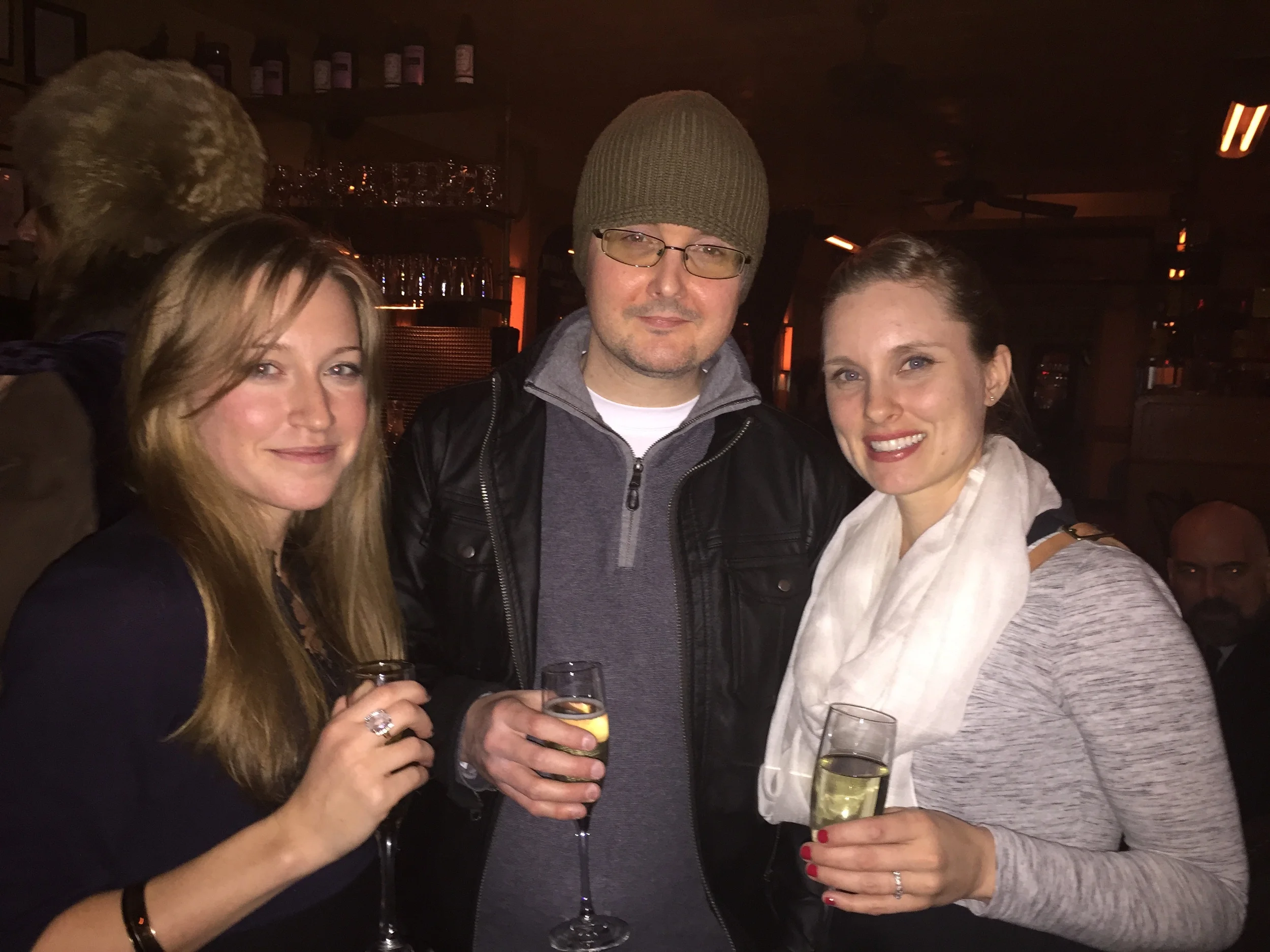 Kyle Minor celebrates with Kristen Radtke and Kristen Miller at the Story Prize after party.