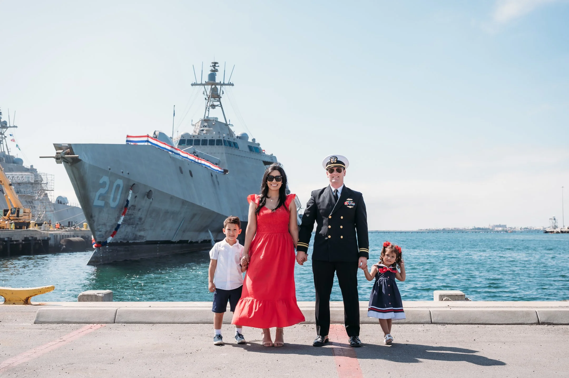 Navy family reunited during a deployment homecoming at Naval Base San Diego in San Diego, California.