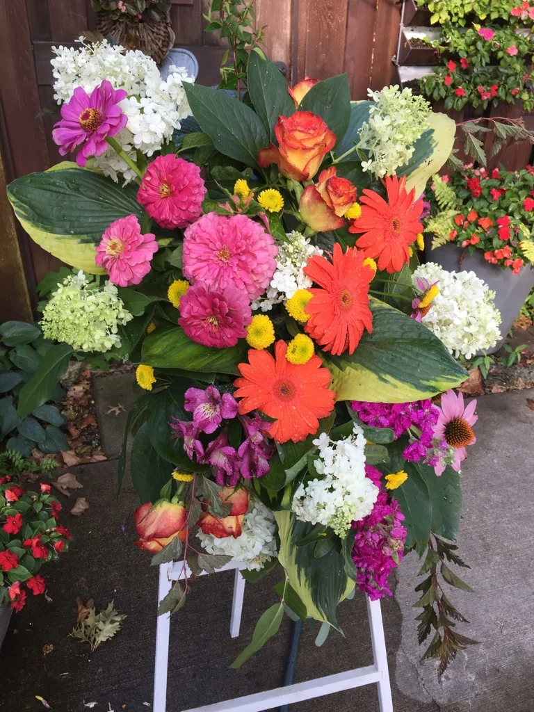  Arrangement, as shown, $145.00  Photo by Belle Fleur. 