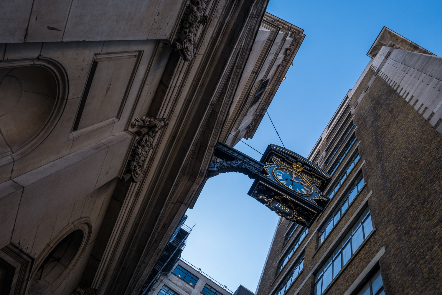 The clock, a later addition, was presented to the church by Sir Charles Duncombe, then Lord Mayor of London, in 1709. According to tradition it is said that "it was erected in consequence of a vow made by the donor, who, in the earlier part of his life, had once to wait a considerable time in a cart upon London Bridge, without being able to learn the hour, when he made a promise, that if he ever became successful in the world, he would give to that Church a public clock ... that all passengers might see the time of day."