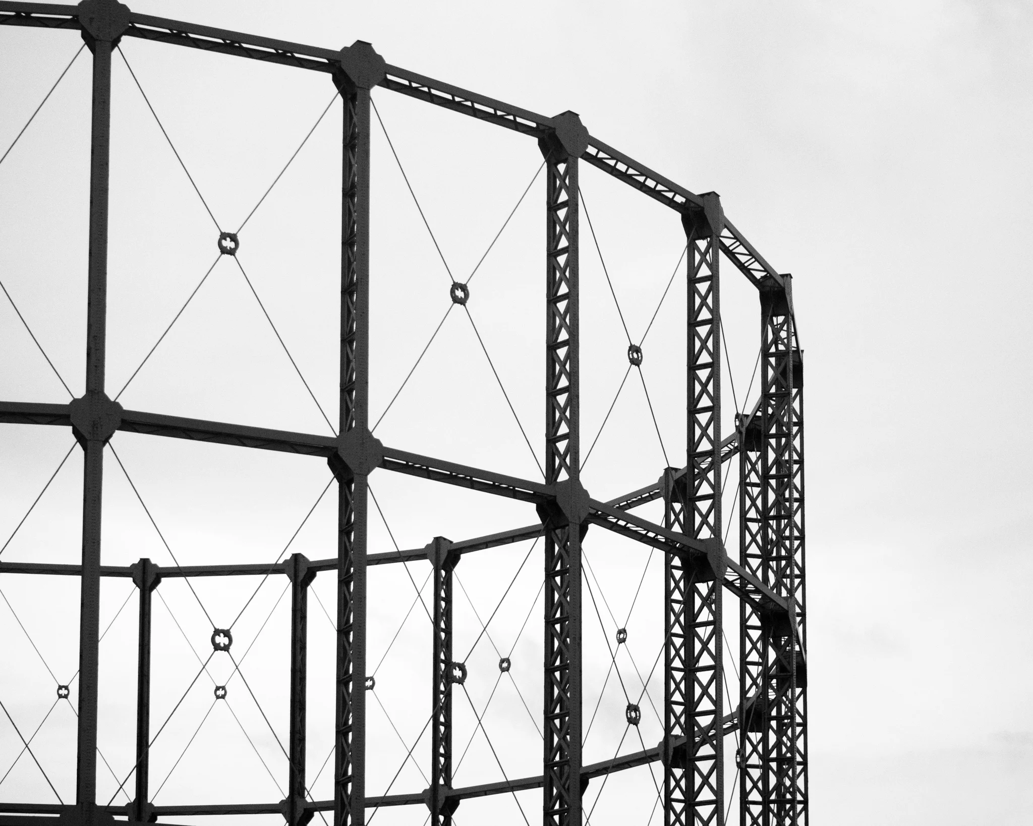 The stark frame of a gas holder on the eastern outskirts of London