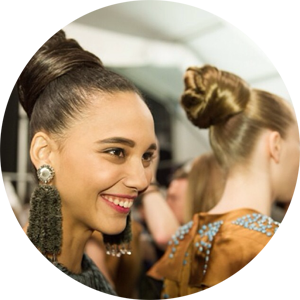 Dramatic buns and ladylike make-up @ Carolina Herrera AW14