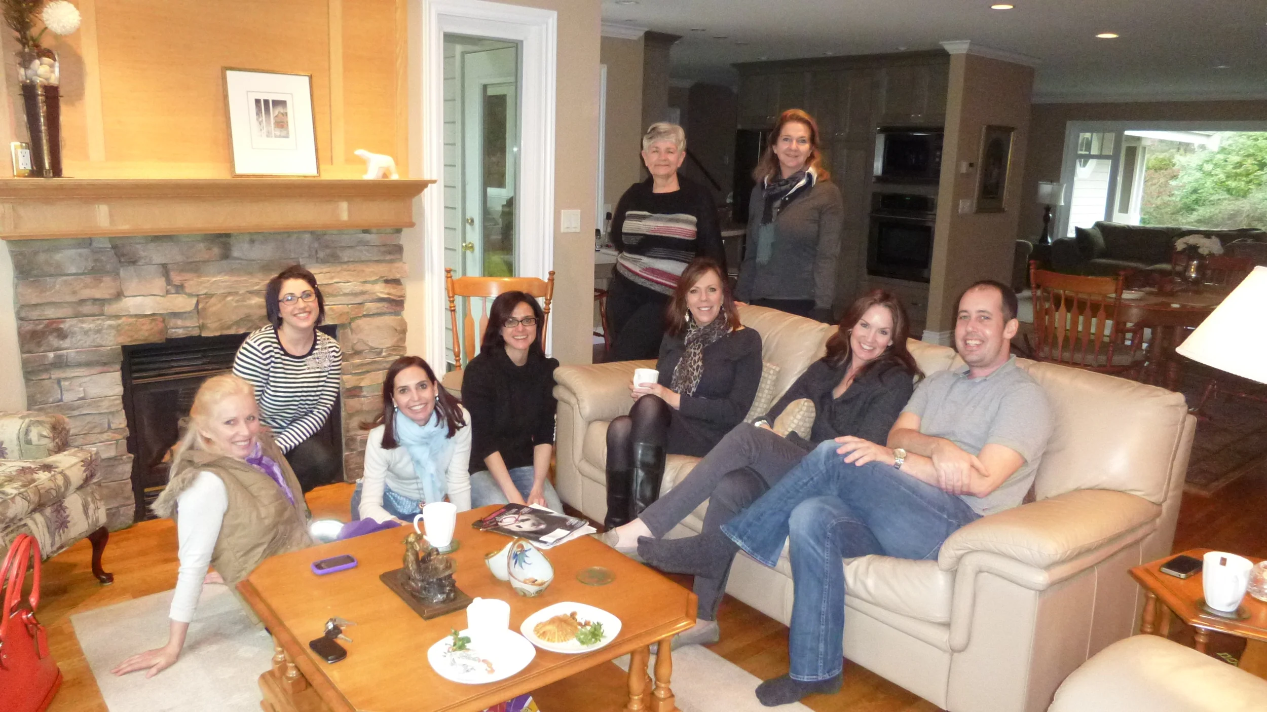 From left to right: Morag Currin, Kerry Kourie, Angela Noviello, Luisa Gullace, standing: Vivian Walwyn, Annemarie Puppe, seated on couch: Becky Kuehn, Jeanna Doyle and Drew Flanagan
