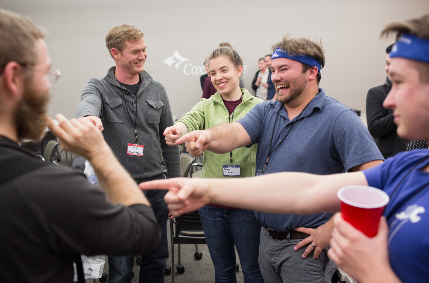 Brett Leeper, Chad Boschert, Fanny Loreal, Logan Elsey and Damian Palmer, left to right, take part in an icebreaking exercise at the start of the Startup Weekend Springfield competition at the eFactory in Springfield, Mo. on Nov. 20, 2015. Photos by Brad Zweerink