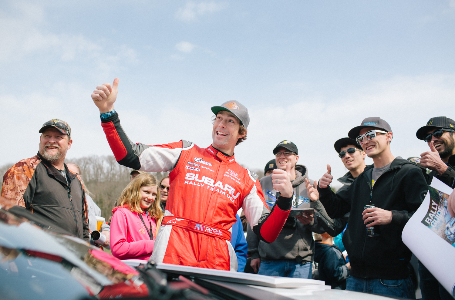 Travis Pastrana poses for a picture with fans. 