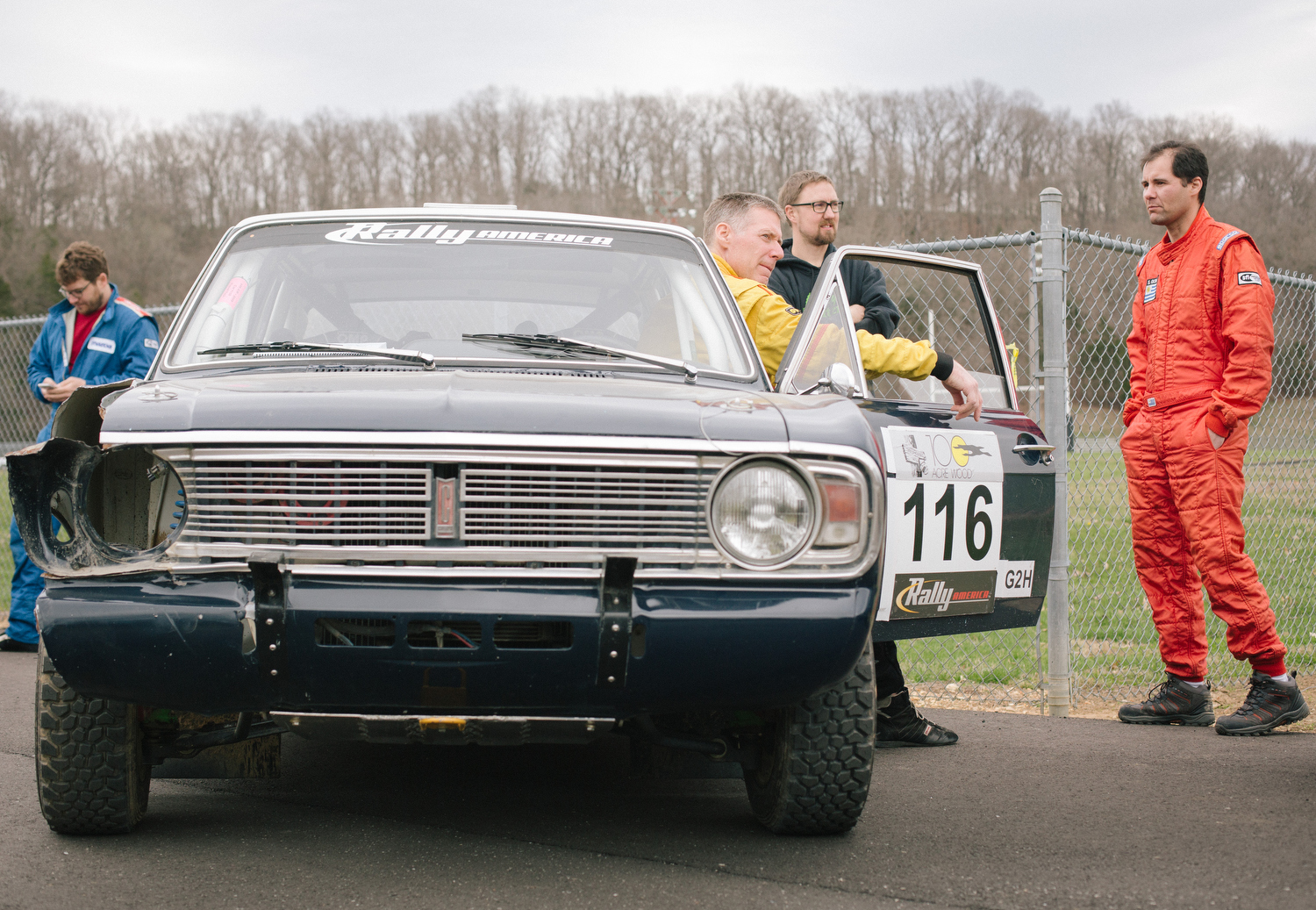 Driver John Hill sitting in his slightly chewed up 1967 Ford Cortina.