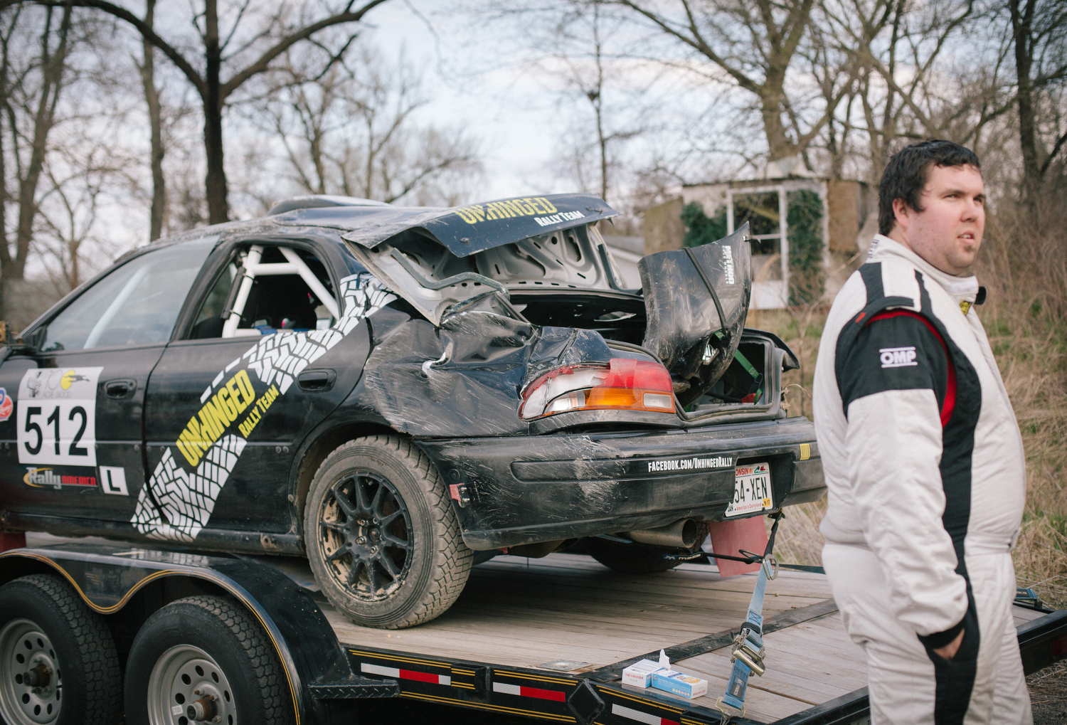 Corey Holmes and his somewhat wrecked 1998 Subaru Impreza. 