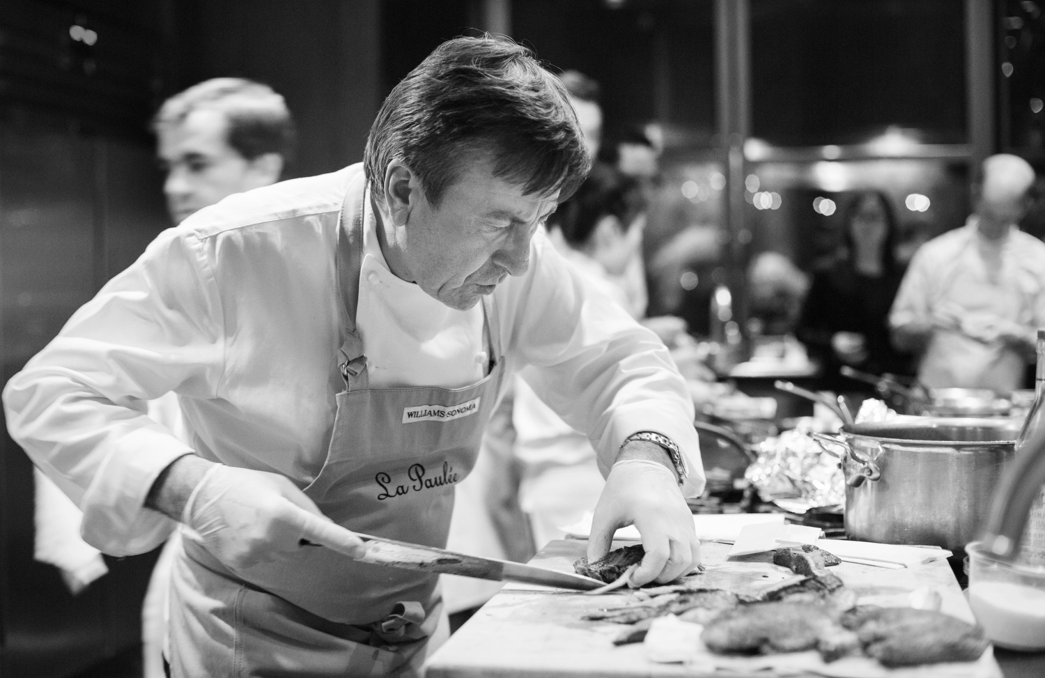  Chef Daniel Boulud slices duck. 