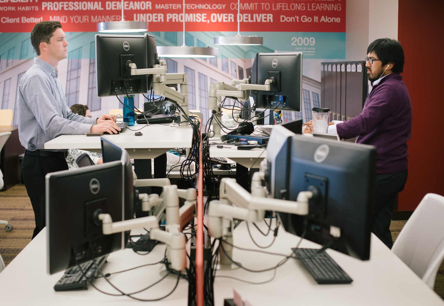BKD audit associates Bobby Kelly, left, and Justin Kim work at the company's Springfield office on Nov. 16, 2016. Photo by Brad Zweerink.