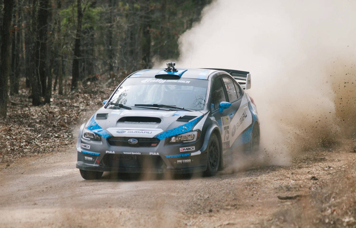  Subaru Rally Team USA driver David Higgins and co-driver Craig Drew on stage three of the race. 