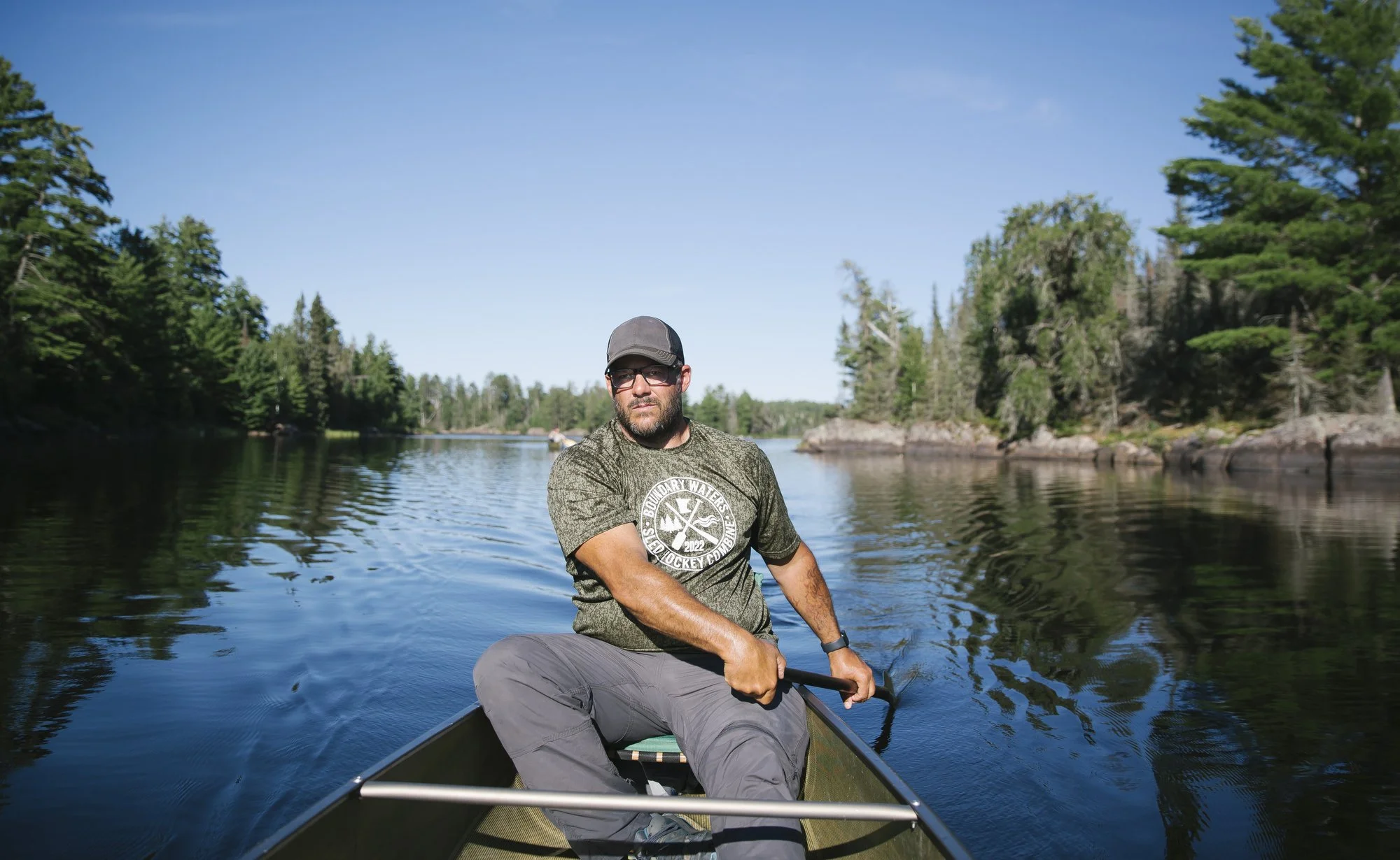  Boundary Waters guide David Hicks paddling his canoe through the wilderness area.  