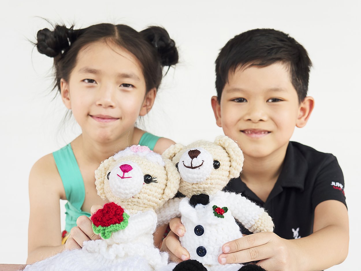 vecteezy_asian-kids-are-playing-wedding-bear-dolls_9298890_665b.jpg