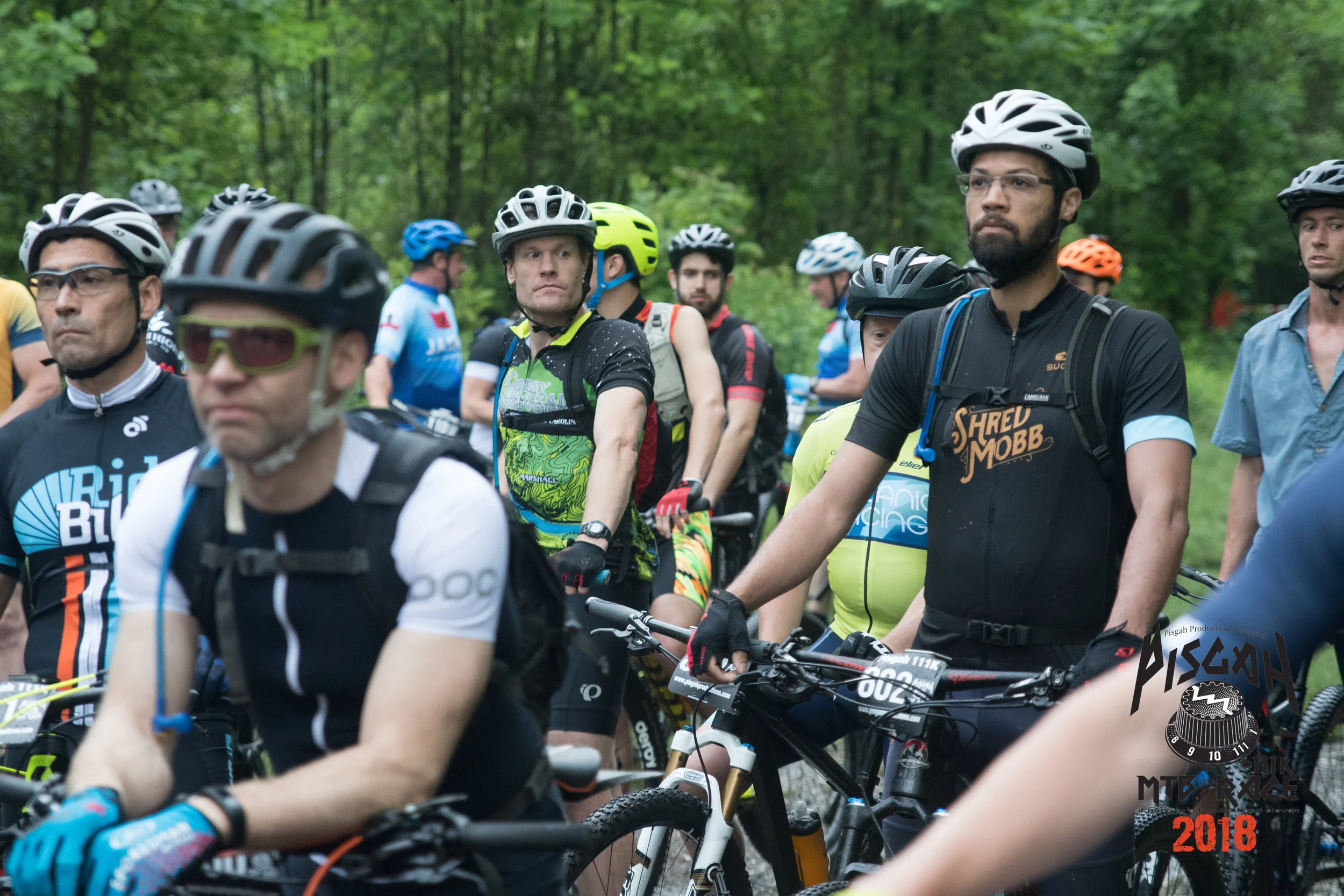 Weather weary racers at the start line. Photo credit: Asheville Icon Media, Steve Barker