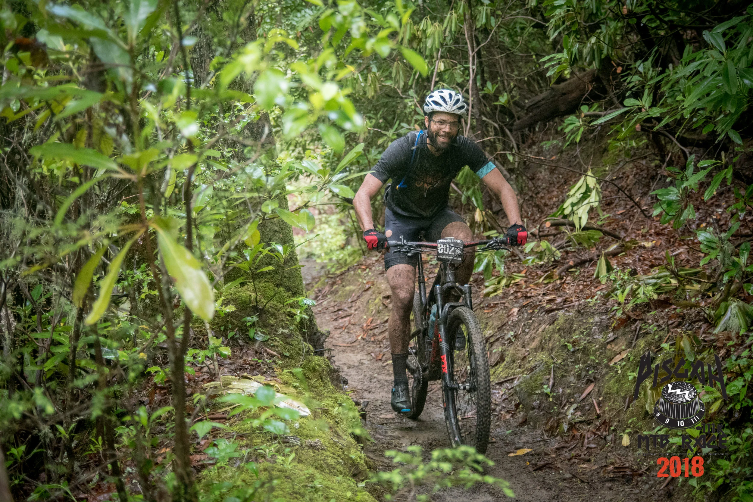 Climbing up to Aid 1. Photo credit: Asheville Icon Media, Steve Barker
