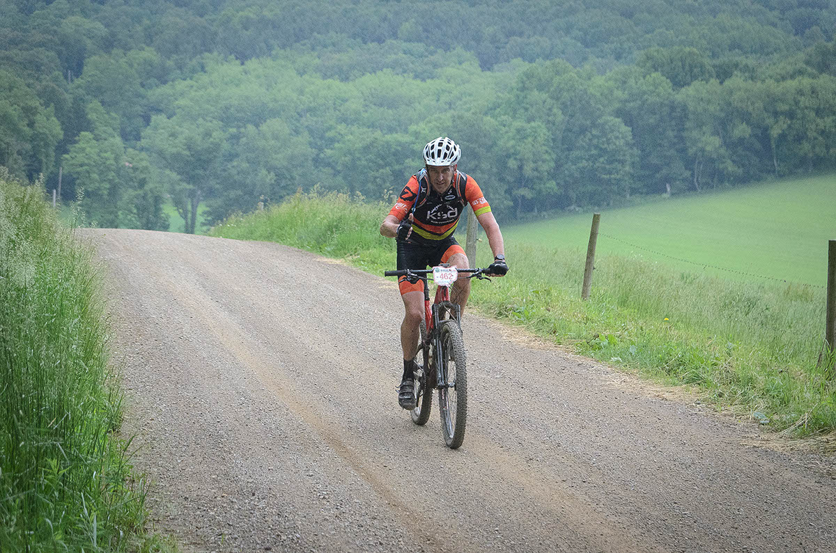 Tom Weaver of Knobby Side Down on the happy side of the Griffin Road Climb. Photo Credit: Butch Phillips
