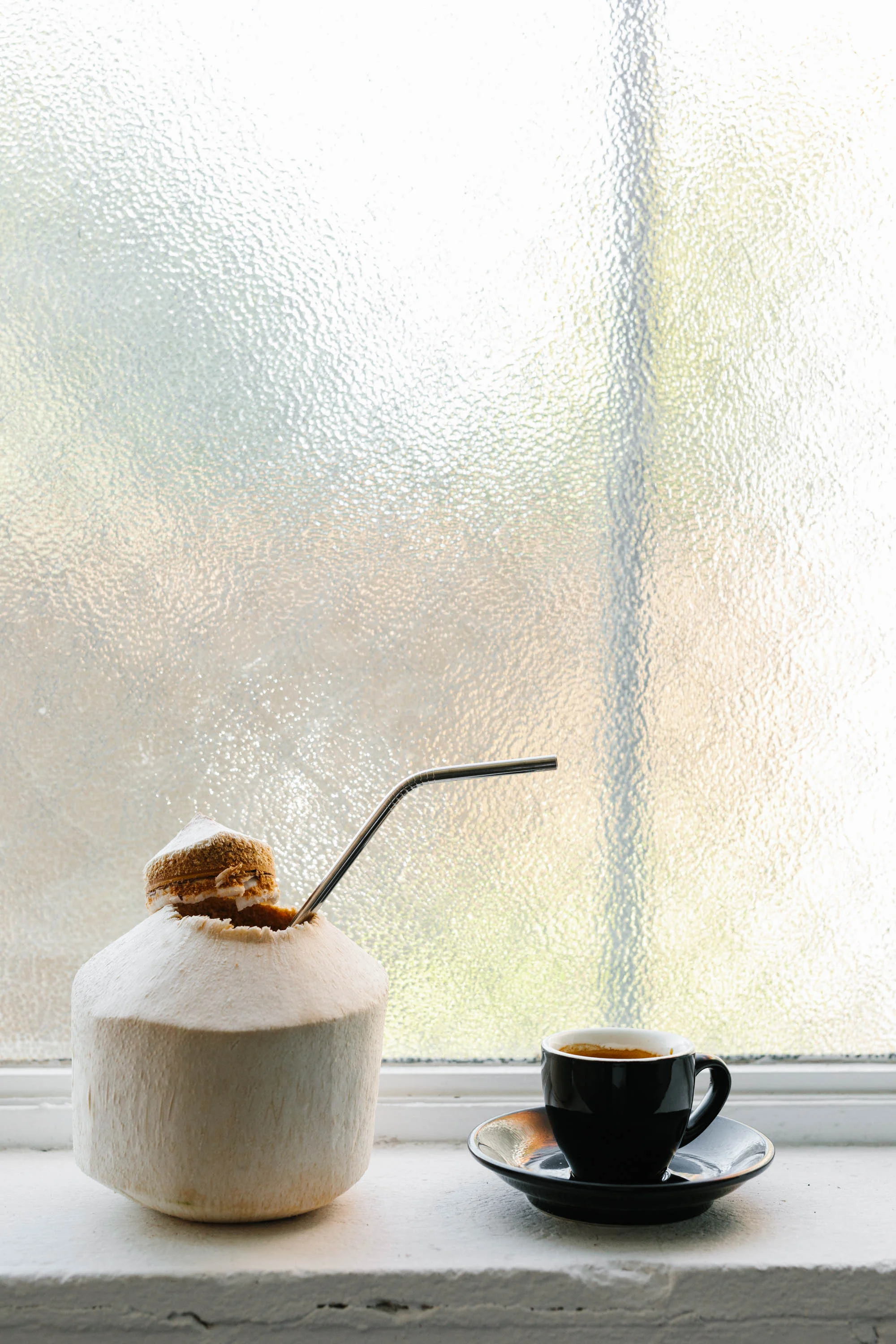 Organic coconut milk and short black coffee by Coconut my Body. Photo: Marnie Hawson