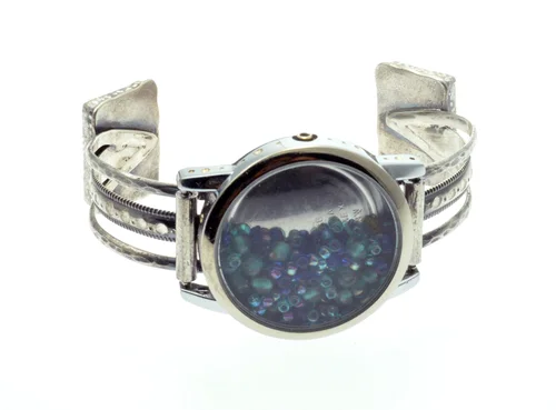 Bracelet made in the "Radical Jewelry Makeover" project: Made of a watch, silver bracelet and turquoise earrings.