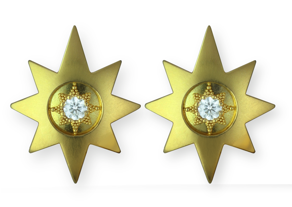 18 karat yellow gold star earrings with 22 karat granulation and white diamonds.
