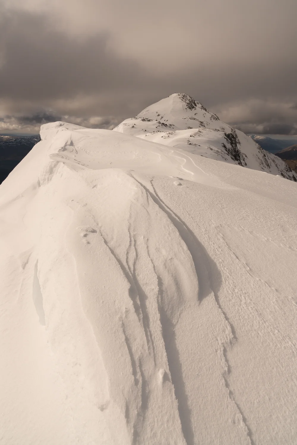 “Broader slopes for a while, light and dark as the skies above danced to their own tune…”