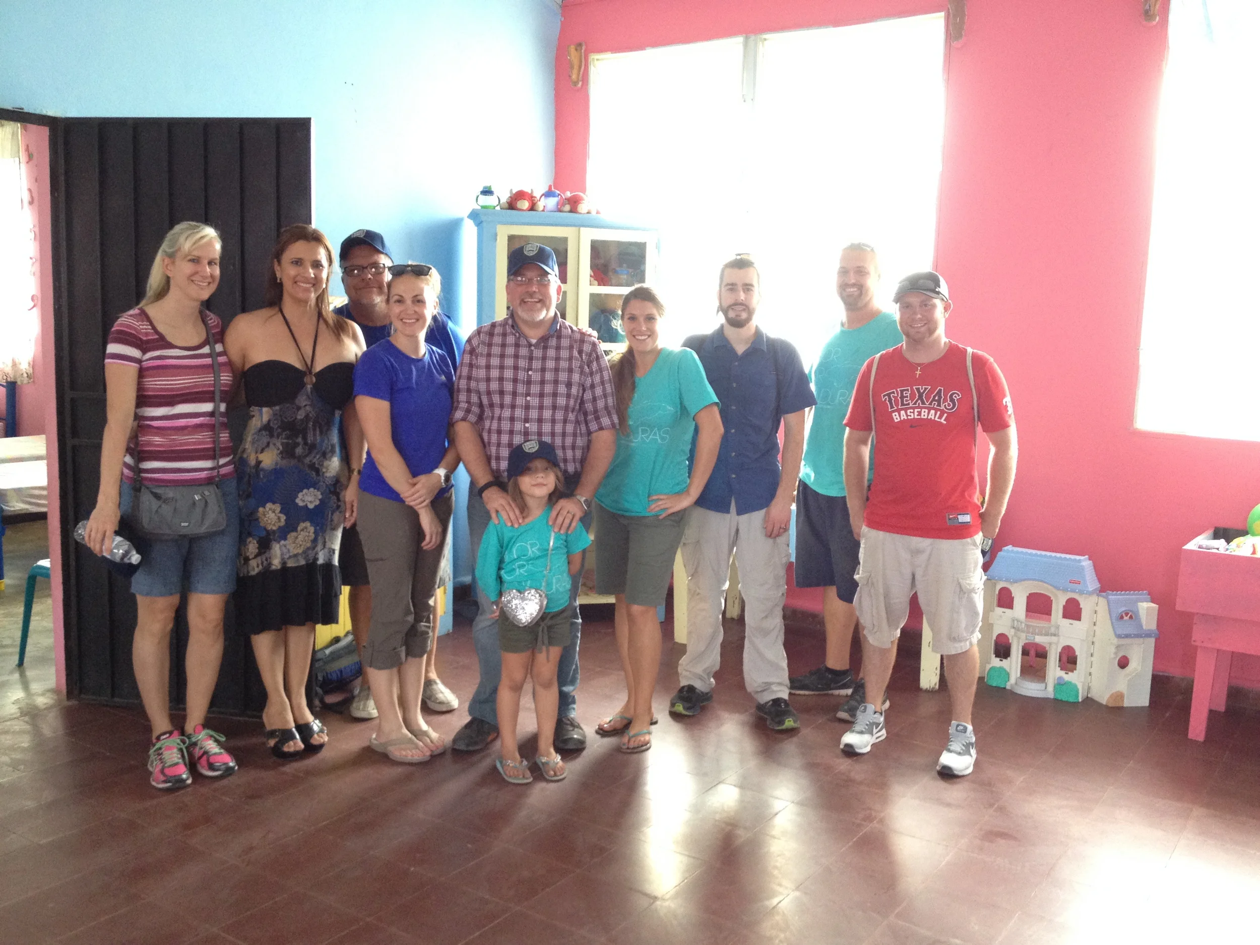 Connect Global team members in one of the newly painted rooms. 