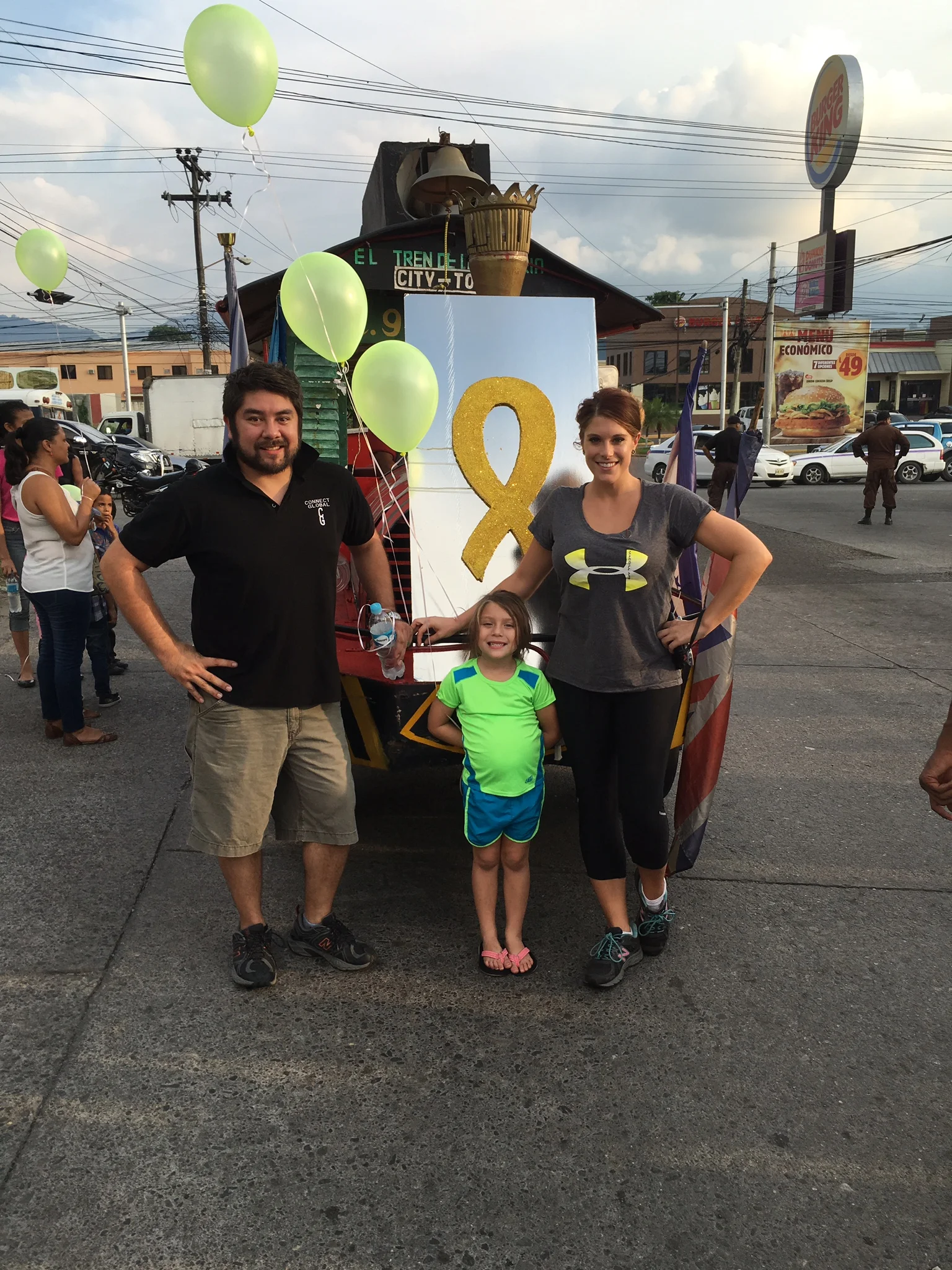 Javier, Danielle, & Saige Mendoza in La Ceiba Honduras supporting a local run/walk in support of kids with cancer. 