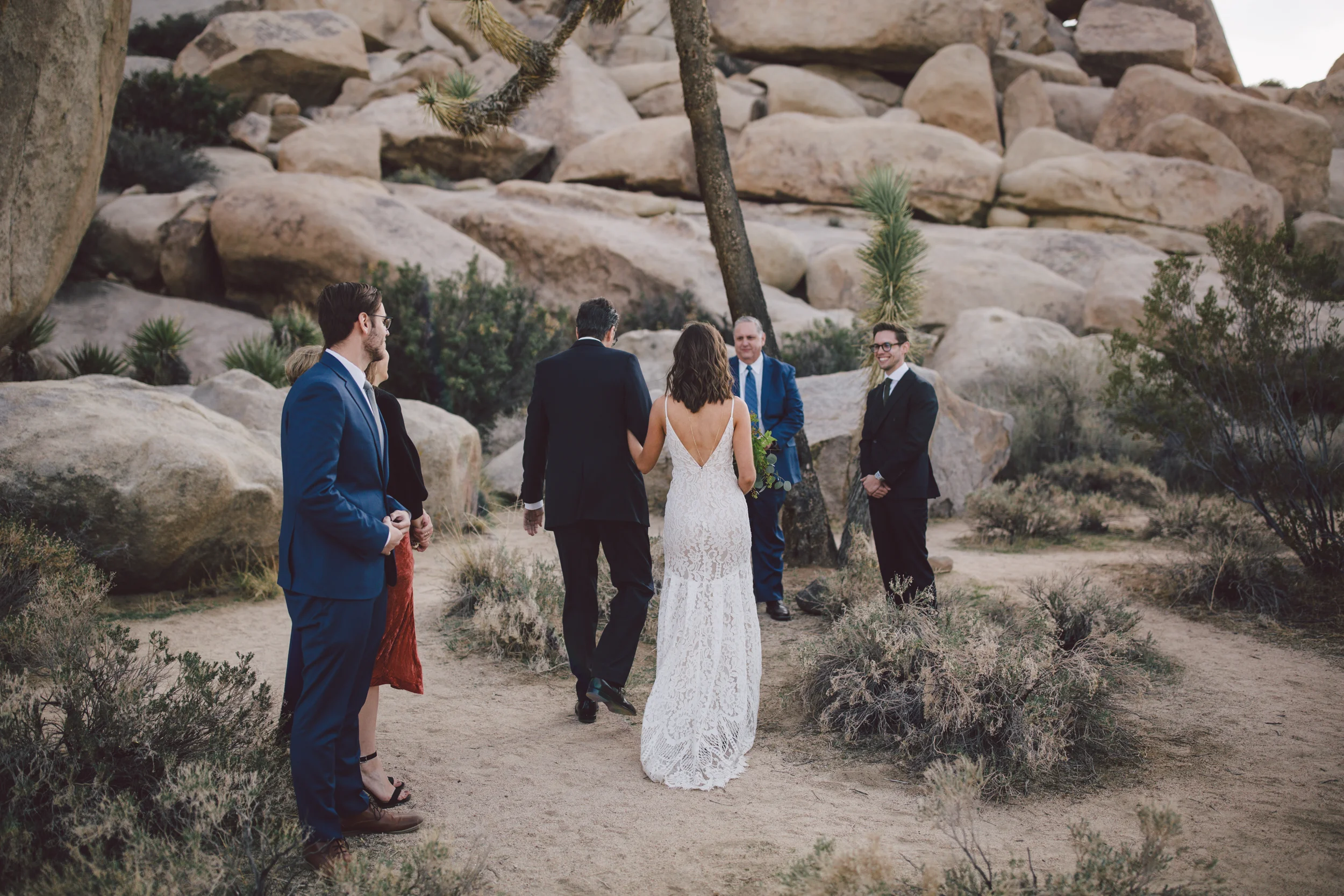 joshua tree elopement ceremony prayer bohemian bride