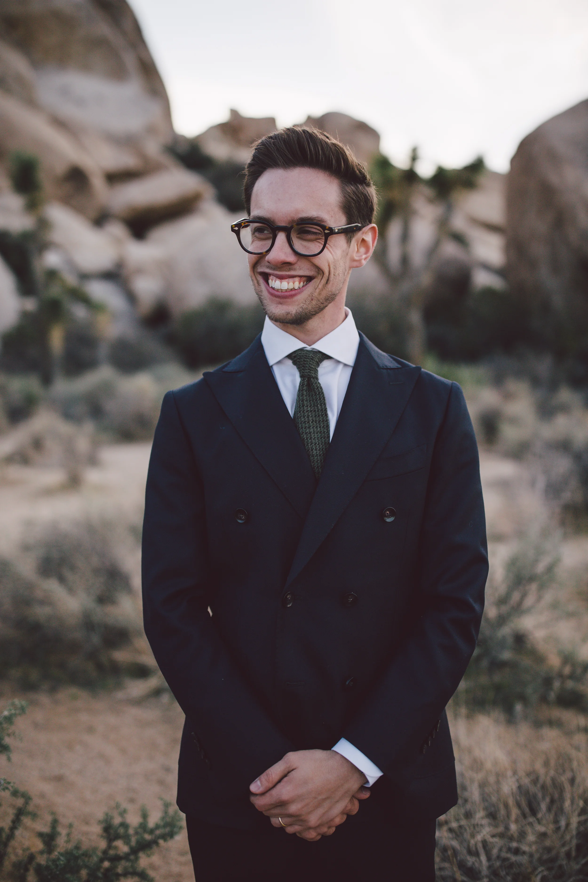 christian groom elopement joshua tree cap rock
