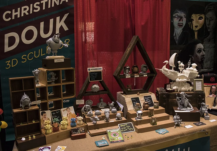 3D modeler and 3D print artist Christina Douk had an impressive display of custom 3D printed and casted figurines for sale.