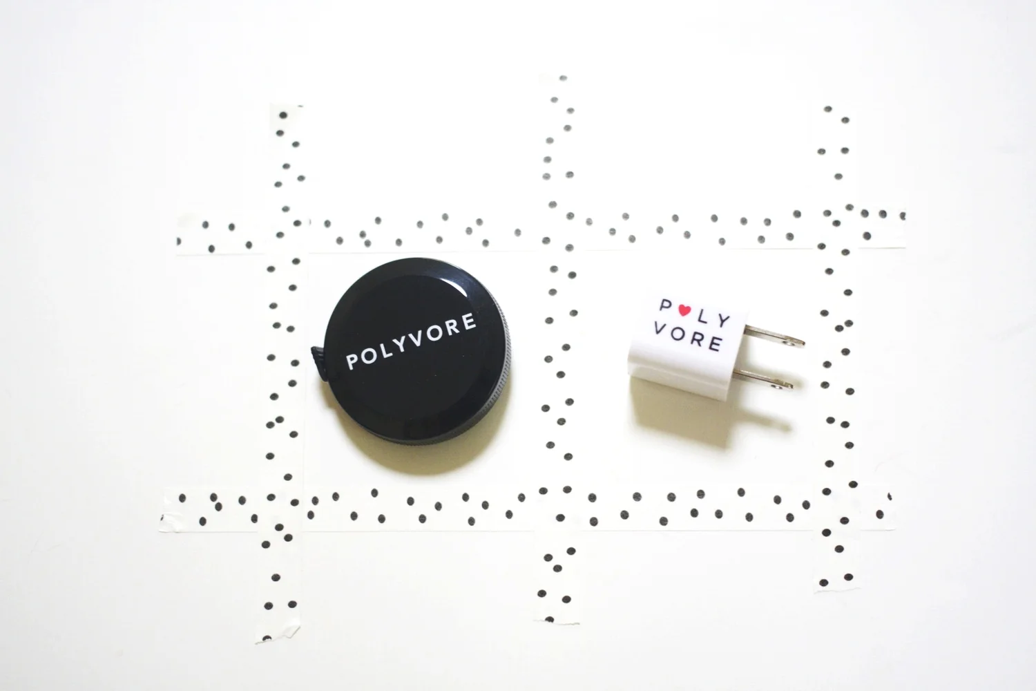 Blog Party host Polyvore contributed these handy tape measures and USB wall chargers.