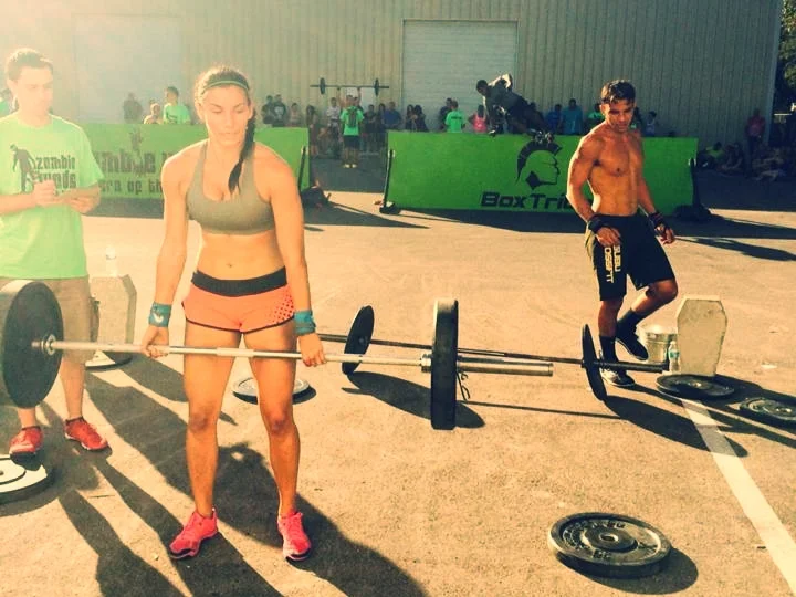 Coach Mia and Sal working through WOD 3 at last year's Zombie WODs
