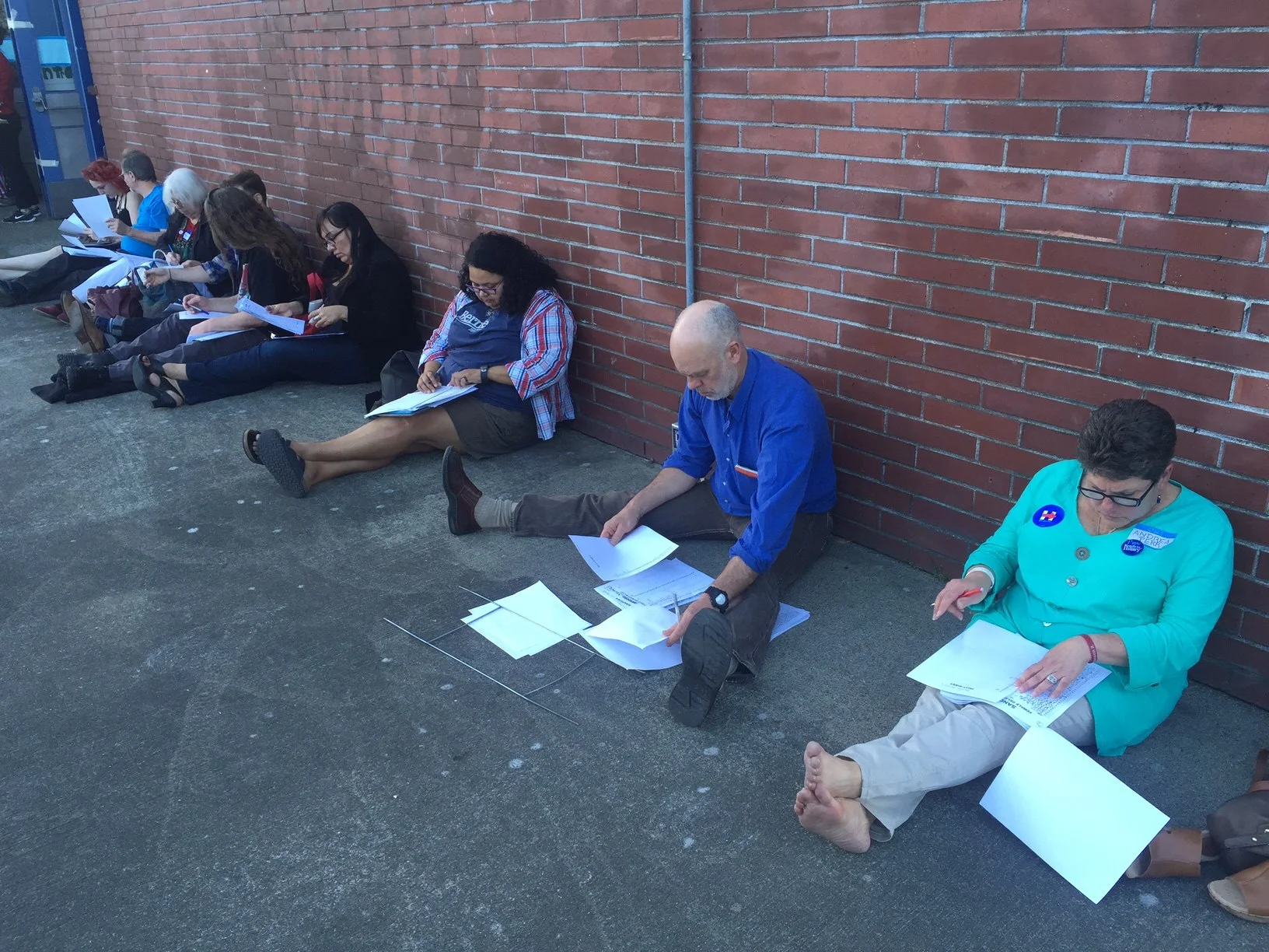 Sanders and Clinton Supporters working side by side in the 43rd counting delegate selection ballots - Photo credit - James Apa