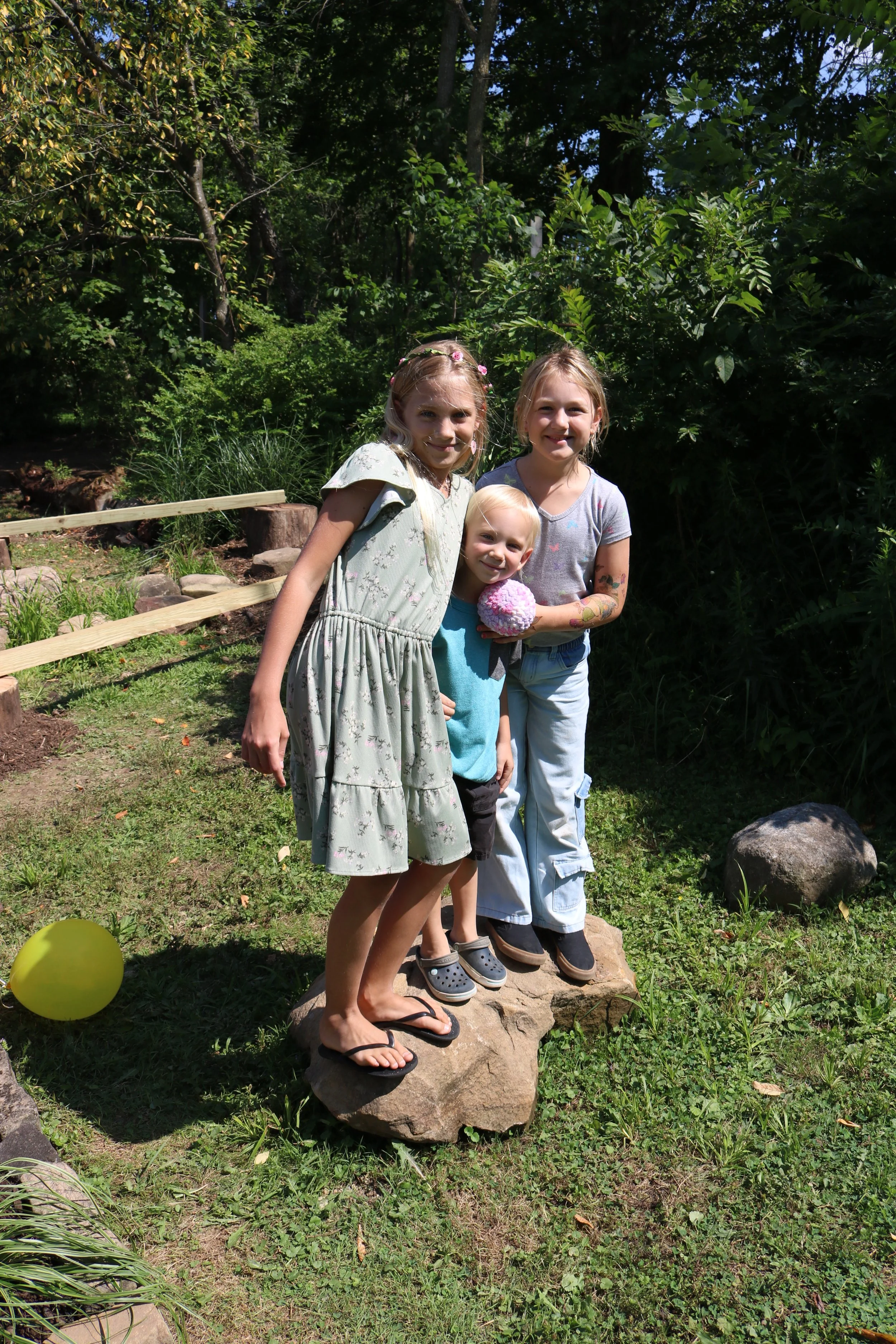 Friends in front of the balance beams
