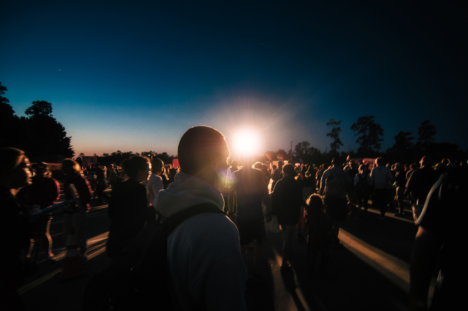  While it's still dark, Jason arrives at the swim start to get numbered and prepare mentally. 