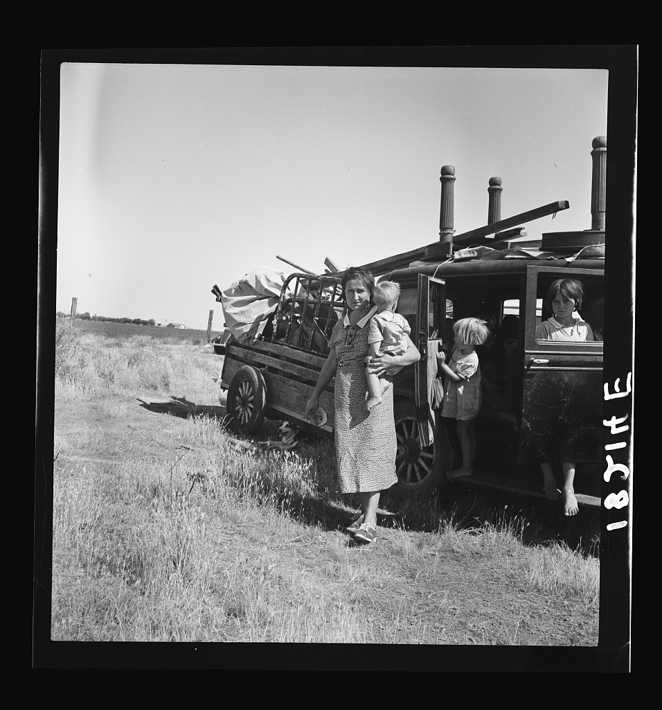  Migrant agricultural labor family. Tenant farmer with six children, refugees from Texas, near Wasco, California. "People just can't make it back there with drought, hailstorms, windstorms, duststorms, insects. They'll all be here in another year or 