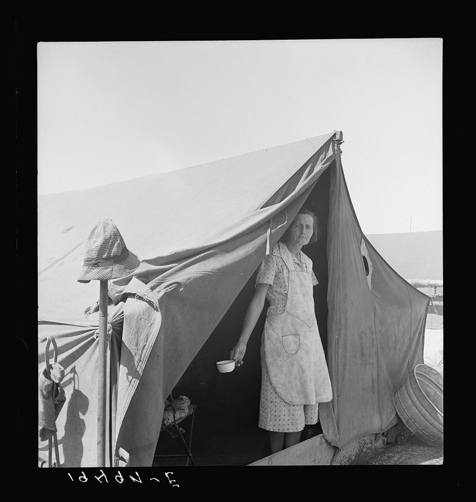  Migrant woman from Arkansas living in contractor's camp near Westley, California. 