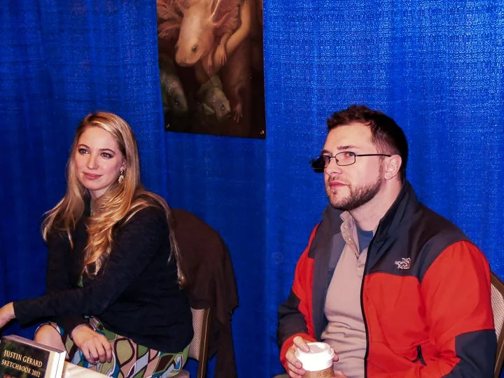 Annie and Justin and their booth via Rob and Jean Carlos
