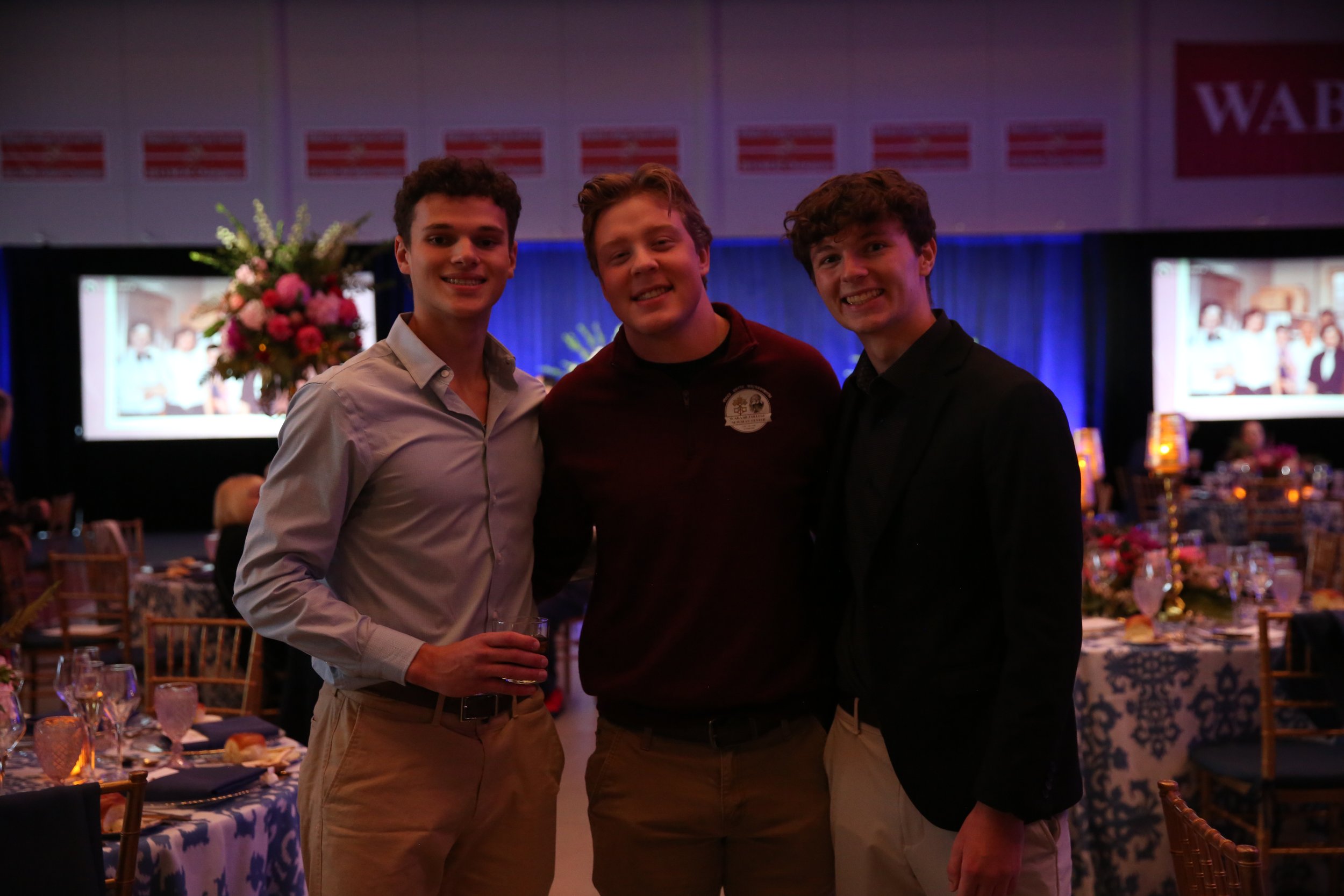  Lucas Carpenter '26, Garrett Dalton '26, and Chris Runyon '26 pause for a quick photo prior to the banquet. 