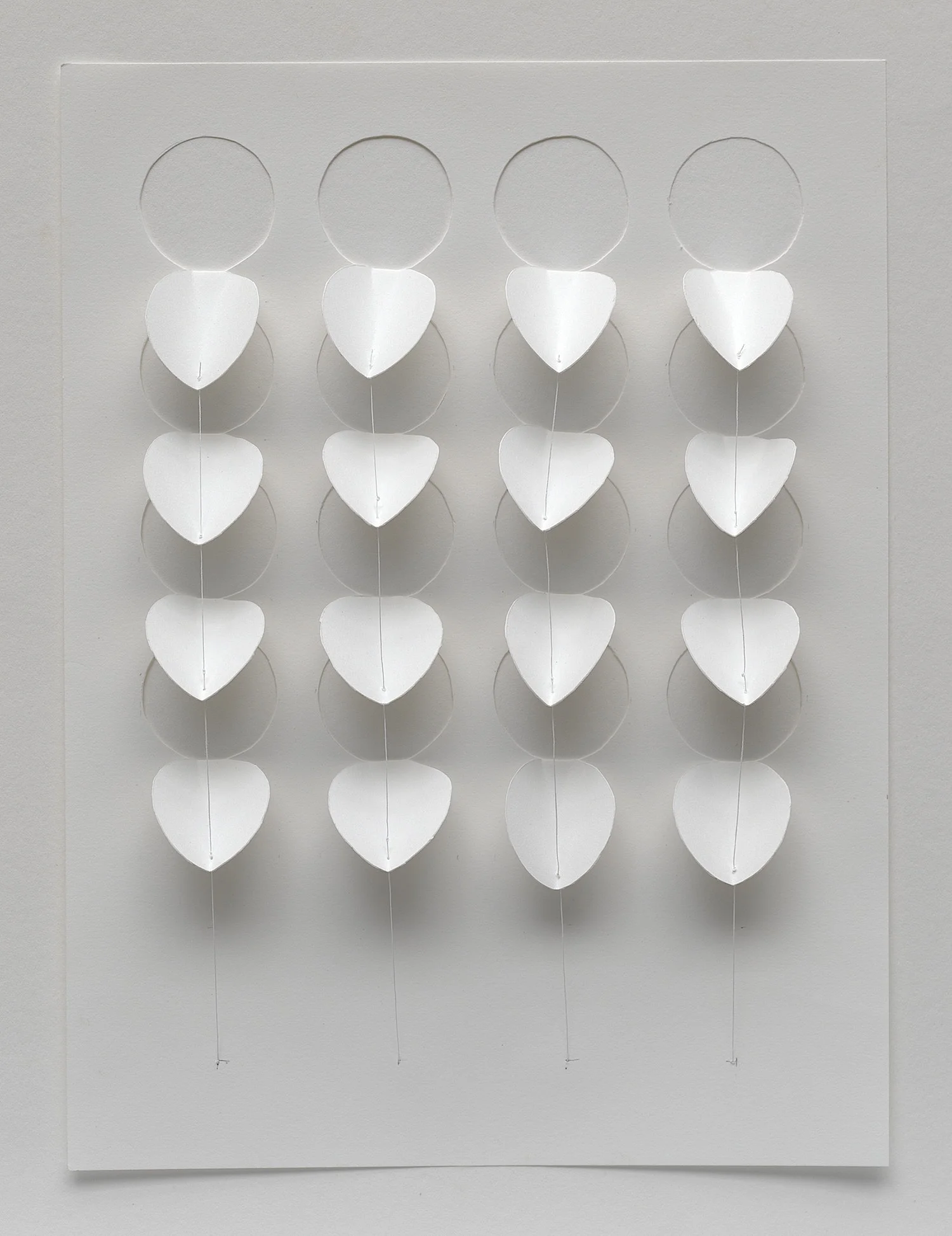  Tug 12” x 9” hand cut paper and thread on board 