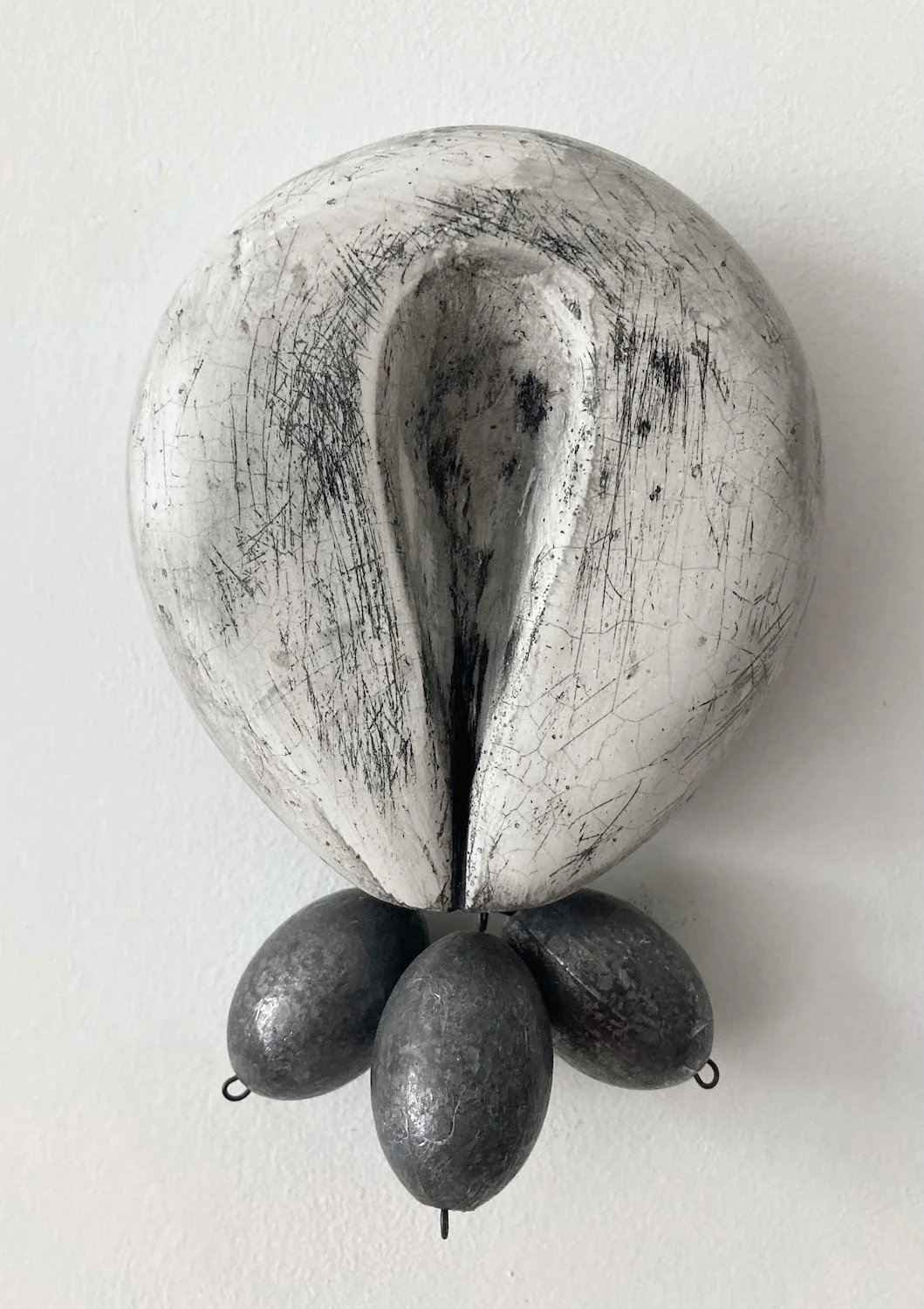  Charm 3 plaster, ink, lead fishing weights, wire 7 1/8” x 4 5/8” x 1 7/8”  