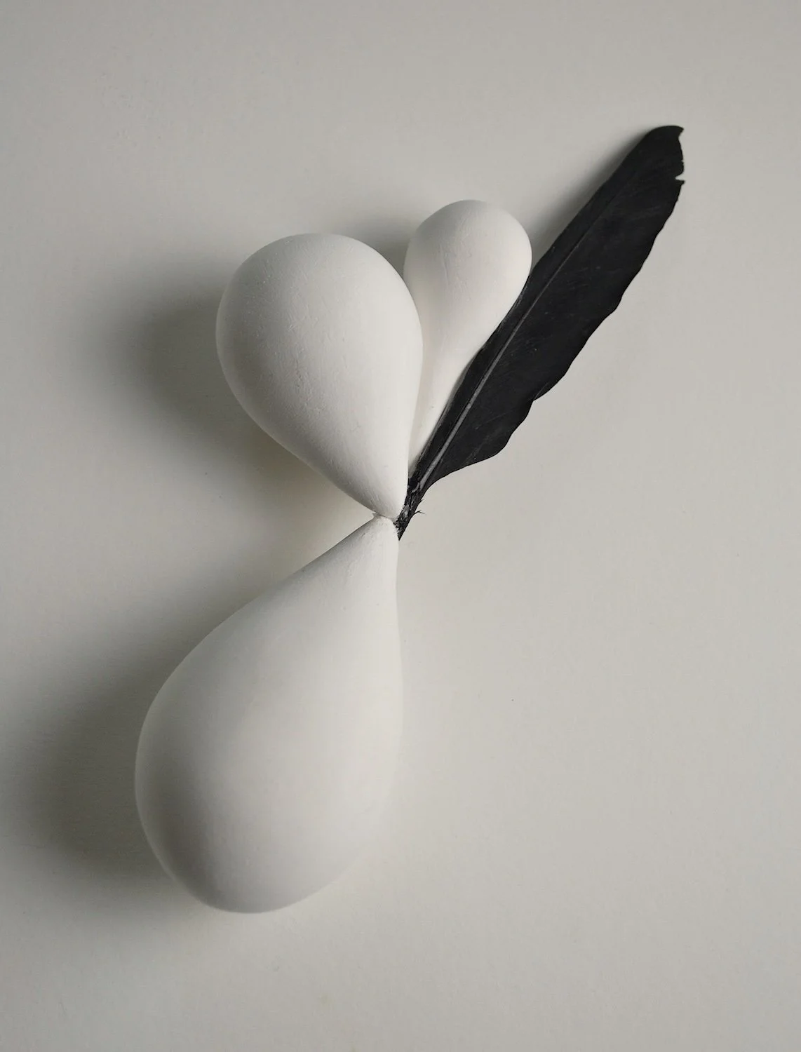  Untitled (Icarus 2) plaster, feather 7 1/4” x 3” x 1 3/8” 