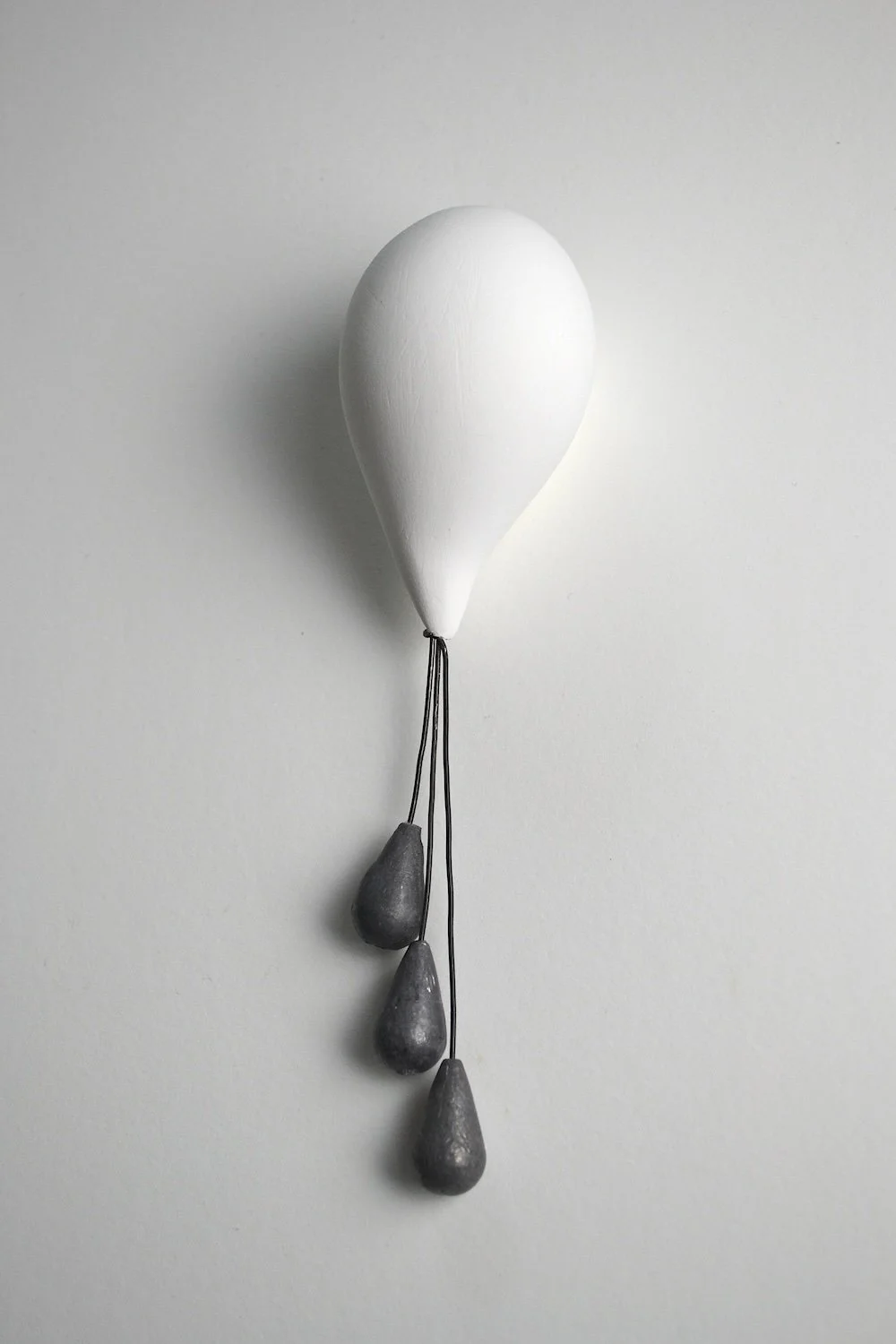  Untitled plaster, lead fishing weights, wire 7” x 2” x 1 1/2” 