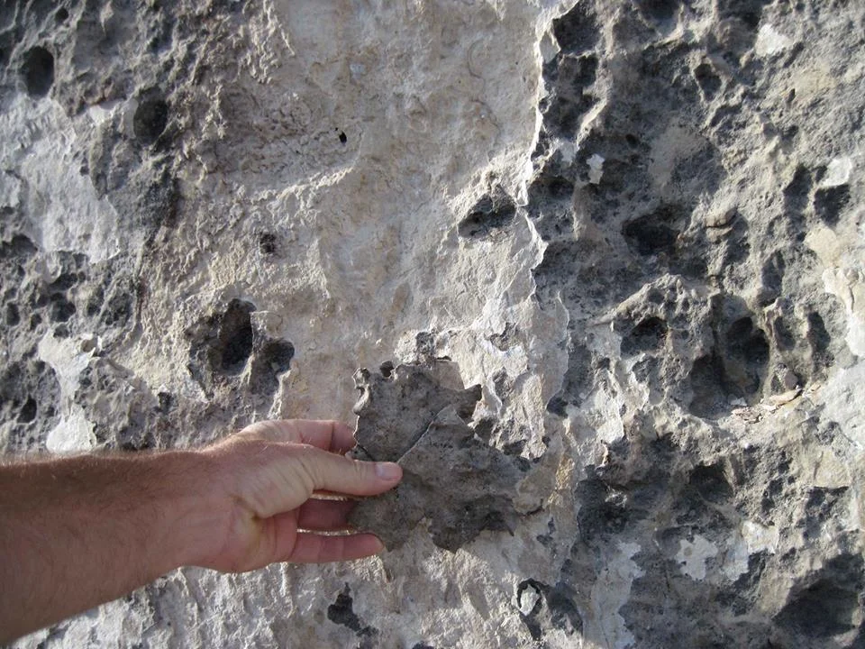 Spalling... the outer surface of the rock is destroyed when the water under the surface is vaporized.
